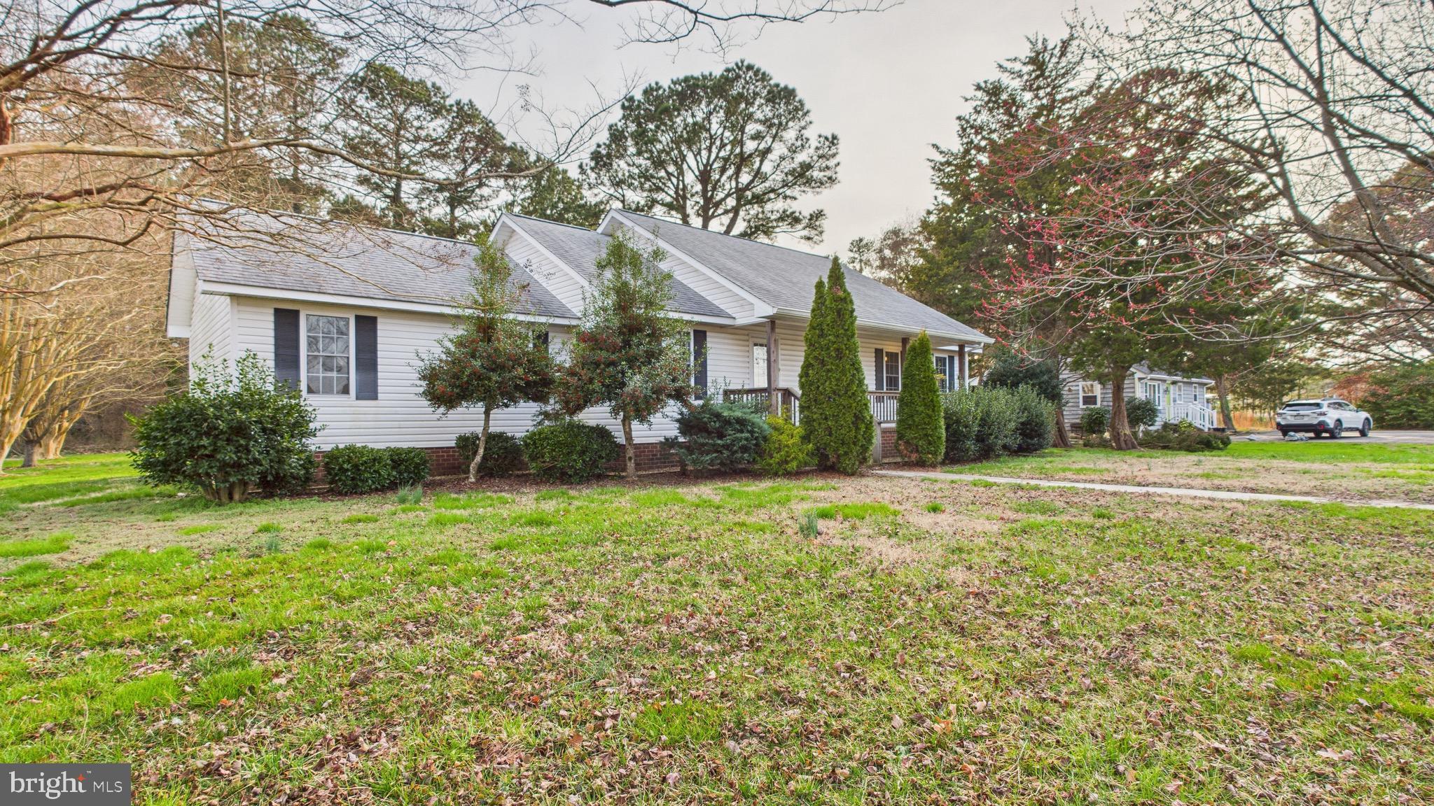 Welcome to 16806 General Puller Highway in the heart of Deltaville, Virginia — a delightful 3-bedroom, 2-bath ranch-style home situated on a beautifully maintained 1.1-acre flat lot. With its charming curb appeal, inviting front porch, and thoughtful upgrades like a whole-house generator and Kinetico water filtration system, this property offers peace of mind and year-round comfort. Inside, you’ll find a bright and airy kitchen filled with natural light, spacious living areas, and easy single-level living designed for convenience and warmth.

Outside, enjoy the expansive yard — perfect for entertaining, gardening, or simply soaking in the calm of this coastal community. A detached storage shed provides extra space for tools, toys, or hobbies.

Located just minutes from marinas, public boat launches, and the open waters of the Chesapeake Bay, Deltaville is a sought-after destination known for its boating culture, quiet beaches, fresh seafood, and small-town charm. Whether you're looking for a full-time residence or a weekend retreat, you'll love being close to local favorites like Stingray Point, Deltaville Tap & Raw Bar, and the Deltaville Maritime Museum. With nearby access to shops, restaurants, and outdoor recreation, this home is your gateway to relaxed coastal living.