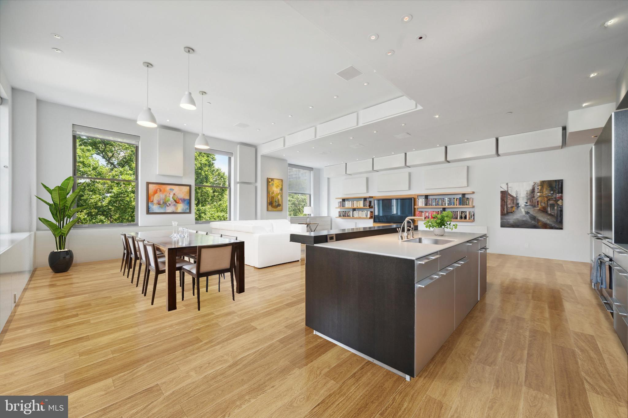 A rare opportunity to own in The Ayer.  Overlooking Washington Square with perfect treetop views, this 2 bd/2 1/2 bath stunner is the perfect retreat in the center of the city.  Embrace the return of entertaining guests with this Bulthaup-b3 kitchen system, featuring Quartz counters, Miele and Sub-Zero appliances, and a significant counter and breakfast bar.   In addition to the kitchen,  this large and open  living area includes the dining space(which comfortably seats 10),  and living area,  all with spectacular views of the Square and streaming sunlight.  This unit has also been thoughtfully customized and updated by the current owner, including, but not limited to, motorized Lutron blackout shades on every window, wiring for sound, motion detector switches for lights in all closets, dual ovens, Smart light switches and LED lights throughout, and an incredibly convenient and sleek built in beverage refrigerator in the Living Room.  The Primary Bedroom has abundant space with a luxurious white marble bath, an oversized glass shower with double  shower heads, and a master closet so big it once included an office.  The second Bedroom is spacious, with an en-suite bath and another oversized closet.  11 1/2 ft ceilings throughout, hardwood floors, expanded closets in the foyer and both bedrooms. Amenities include 24-hour hotel-style concierge, chauffeur-driven new Hybrid BMW, fitness center, and an exclusive garden terrace. And bring along your pup, because The Ayer is a pet-friendly building.