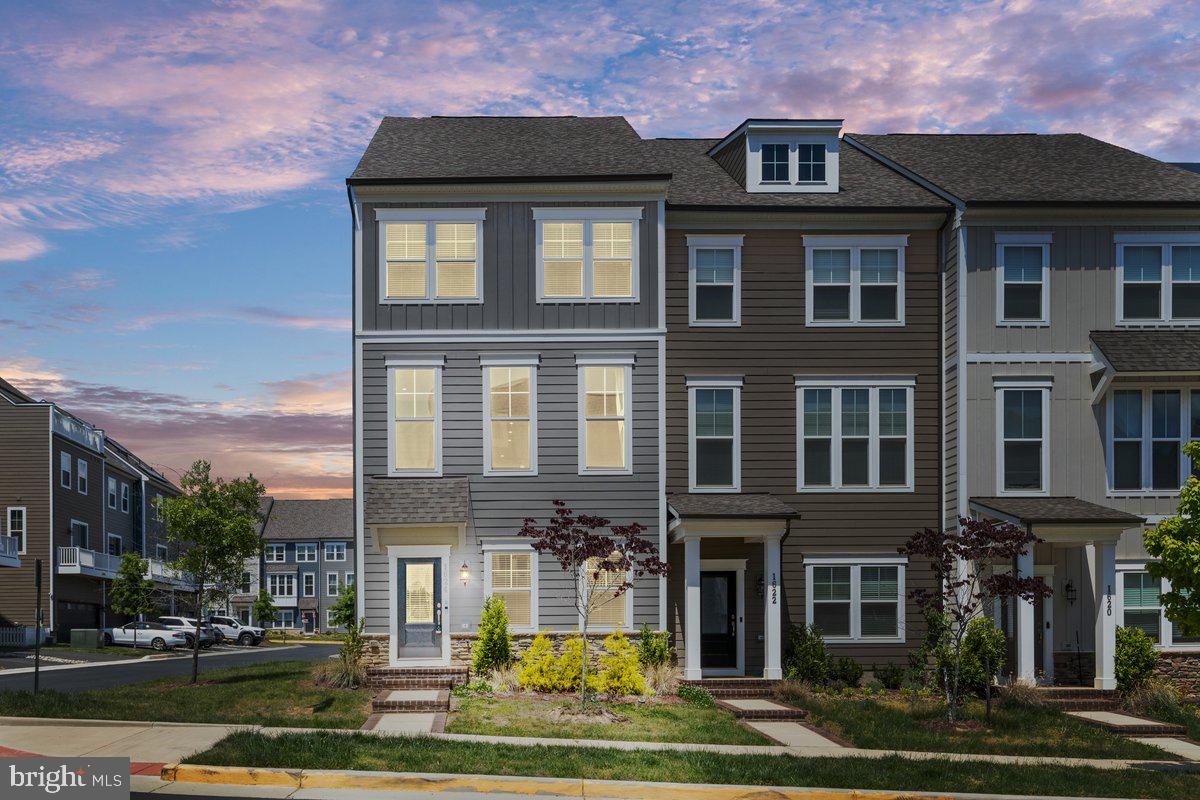 Stunning  - 3 years new!  Discover the unmatched charm of this gorgeous four-level end-unit townhome in the coveted Potomac Shores community. Live every day like you're on vacation in this breathtaking resort-style neighborhood, packed with incredible amenities.   Boasting over 2,700 sq. ft. of luxurious living space, this home is truly must-see. The spectacular fourth level is a standout, featuring stunning floor-to-ceiling windows and direct access to a private rooftop terrace.  Whether used as a fourth bedroom or a spacious great room, this versatile area is sure to impress.   Speaking of the rooftop terrace—come take in the panoramic views of this beautiful subdivision from this extraordinary vantage point.   Property is located in rich amenity filled community complete with indoor gym, pools and much more.   Smoke free/ pet free.  Shows like a true model!  Available immediately for rental following satisfactory application with landlord approval and payment of necessary fees.