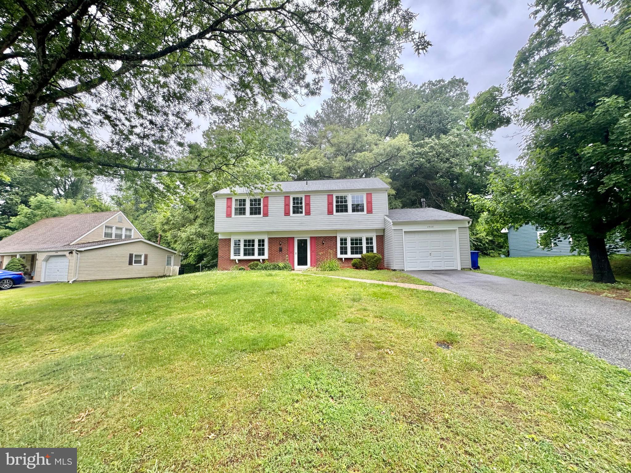 Must See! 4 bedroom 2.5 full bath Colonial home totaling 1,872 sq ft sits on .24 acre lot in sought after Rockledge at Belair Community!  Freshly painted throughout. Main-level living room large windows bring in the natural sunlight! New laminate flooring.  Dining room  has laminate flooring and door acccess to kitchen.  Kitchen has ceramic tile flooring, updated cabinets and door access to laundry room.  Kitchen breakfast room has slider door to exterior rear patio.  Wooded rear view! Powder room has updated vanity and light fixture. Laundry room has full size washer dryer, door access to exterior side and door access to front garage.  Garage floor just painted.  Upper-level has large primary bedroom w/ laminate flooring, 2 closets and attached bathroom with updated vanity and tiled shower.  3 additional spacious bedrooms w/ new laminate flooring.  Updated hallway bathroom has tiled tub shower.  Close to shops, restaurants.