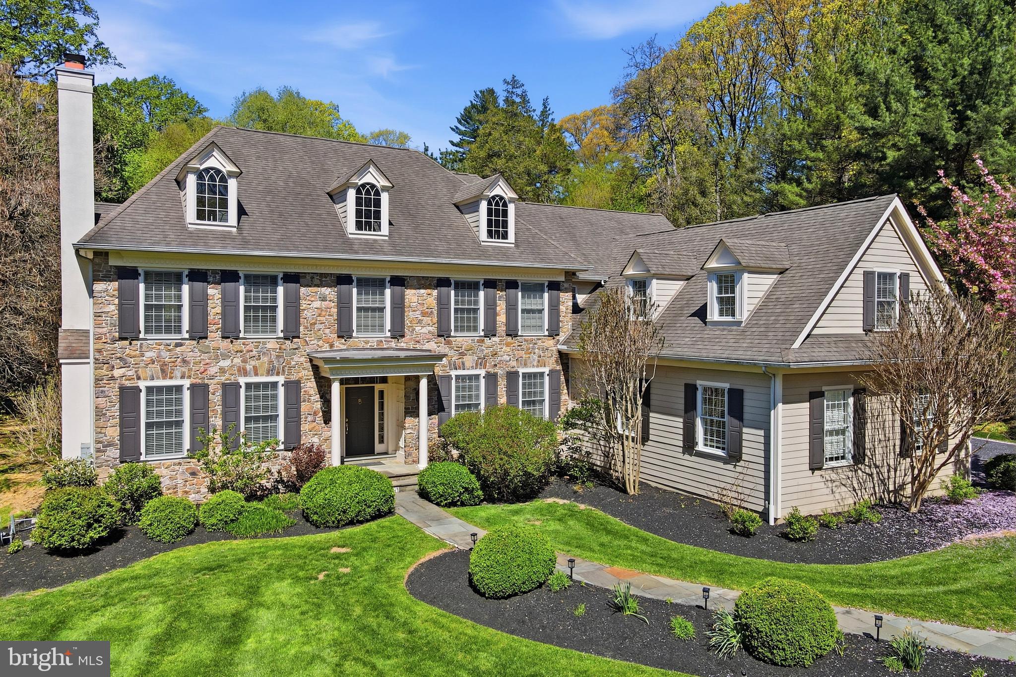 Step into refined comfort and timeless elegance with this stunning 4,600 sq. ft. home, thoughtfully designed for both everyday living and exceptional entertaining. Boasting 6 spacious bedrooms and 4.5 beautifully appointed bathrooms, this residence offers the perfect blend of luxury and functionality, complemented by rich hardwood floors throughout.

The heart of the home features a gourmet kitchen with sleek granite countertops, ample cabinetry, and a premium Sub-Zero refrigerator, along with a built-in wine fridge—ideal for hosting or unwinding at the end of the day. Multiple living spaces are enhanced by two cozy gas fireplaces, while 9-foot ceilings and an open-concept first-floor layout create a bright, inviting flow. Designed with entertaining in mind, the main level is also wired with speakers in every room, making gatherings seamless and enjoyable.

A versatile first-floor office or bedroom provides flexibility for guests, remote work, or multigenerational living. Upstairs, generously sized bedrooms offer comfort and privacy, including an additional bedroom with its own private en-suite bath—one of three full en-suite bedrooms in the home. The primary suite is airy and expansive, featuring a tray ceiling, a walk-in closet with custom organizers, and a spacious bathroom complete with an oversized shower and claw-foot soaking tub.

For leisure and entertainment, enjoy a dedicated billiards room—perfect for game nights and gatherings. The finished three-bay garage is equally impressive, offering built-in closet organizers and epoxy flooring.

The expansive unfinished basement presents endless possibilities, already piped for a future bathroom and featuring high ceilings, egress access, and windows that allow for natural light. In addition to its impressive size, the basement includes a bonus storage room, providing even more space to keep everything organized and out of sight.

Step outside to a private backyard retreat, perfect for quiet mornings with coffee or relaxing afternoons under the retractable awning. Surrounded by nature, the yard attracts a variety of birds—including woodpeckers and cardinals—offering a peaceful and scenic outdoor experience.

Additional highlights include a whole-home generator for peace of mind during inclement weather, dual-zone heating and cooling, and convenient location near several major hospitals and private schools.

This exceptional property truly has it all—space, style, and the potential to make it uniquely yours.