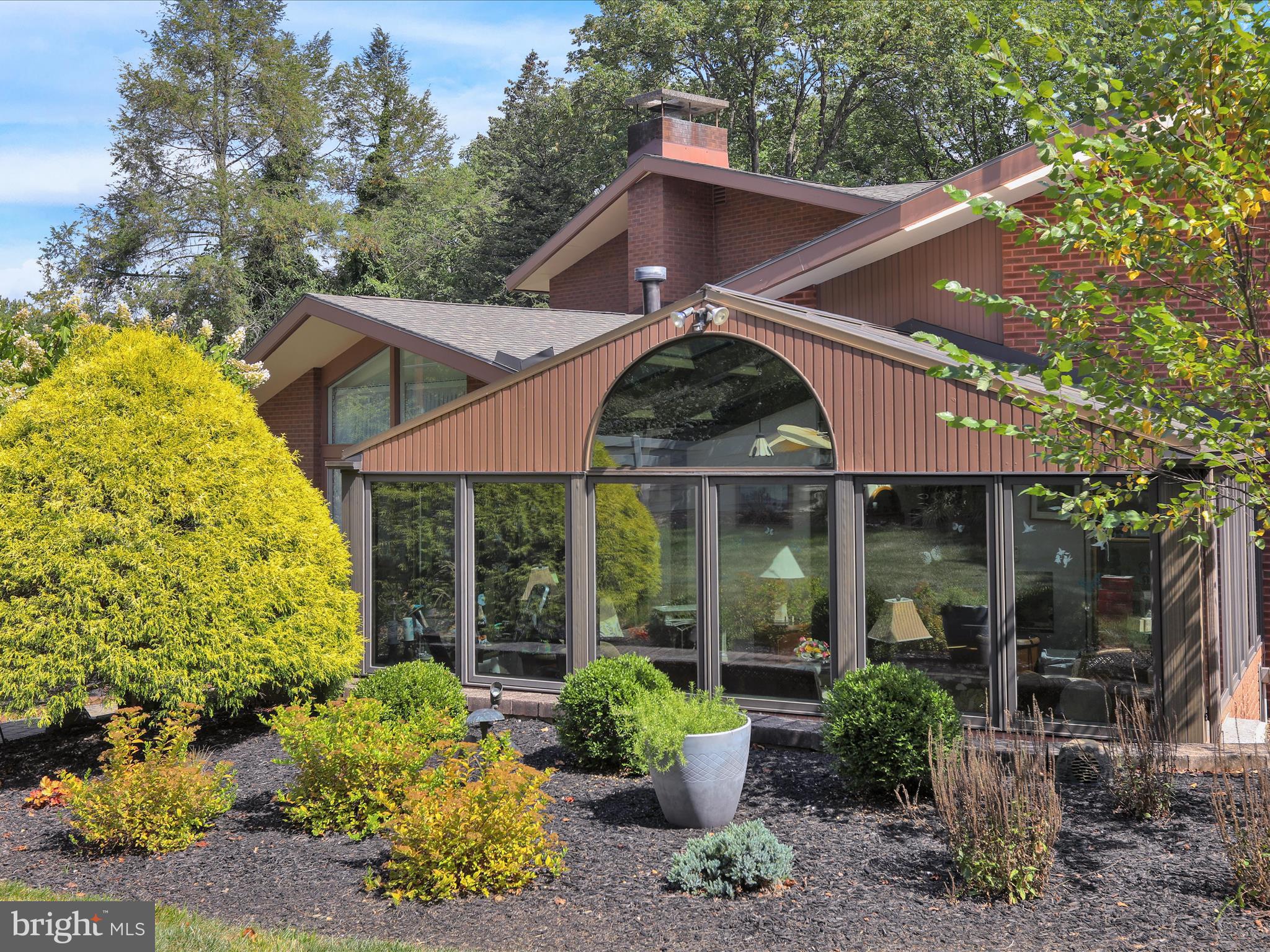 Welcome to 1617 Meadowlark Rd, nestled in the heart of lovely Birdland. This exceptional residence has been lovingly maintained by its original owners after a custom design by Elmer Veres of Muhlenberg, Greene & Veres Architects. The home showcases a custom layout highlighted by a dramatic and vaulted entry with brick flooring and custom 8 foot double doors crafted by a local Craftsmen. 
The circular driveway, framed by custom masonry walls, has a stone walkway, and elegant lighting, leading to your striking entrance.  Over the years, the owners added numerous upgrades and enhancements, including a convenient three‑stop elevator. The impressive 32' x 16'  vaulted ballroom offers endless possibilities—perfect for entertaining, hobbies, or creating a truly unique living space. A bright and inviting sunroom overlooks the beautifully landscaped, private backyard and the sparkling saltwater in‑ground pool, creating a serene retreat for relaxation.  Every detail reflects the care and pride poured into this home. Enjoy your recently updated luxurious main bathroom featuring a steam shower and walk in tub. The huge closet is very welcome. The junior bedrooms are bright and airy. This is a rare and special property—one you’re sure to fall in love with.