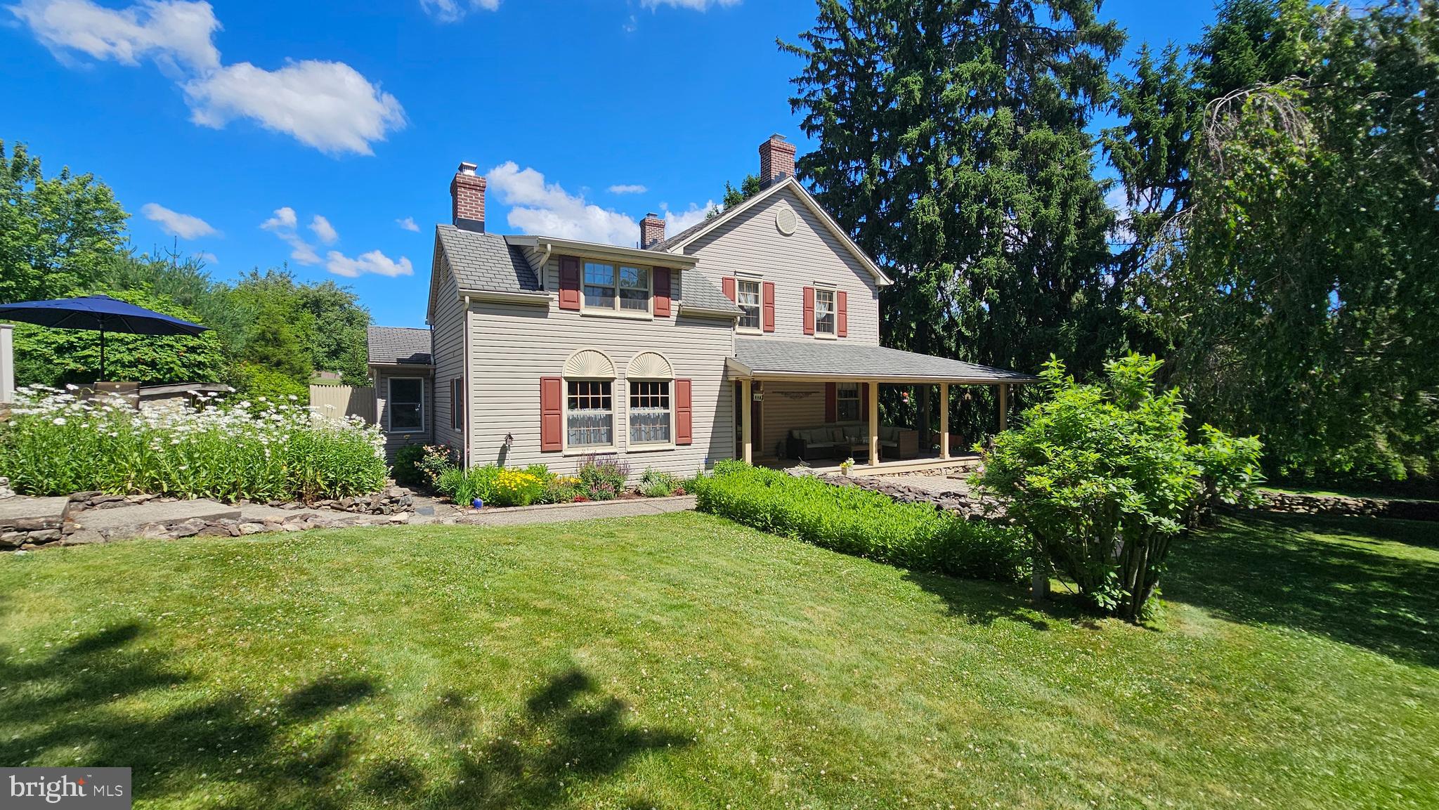 Looking for privacy, a manageable lot, and an unbeatable location? Welcome home to this exceptional property in the peaceful countryside of Williams Township, where tranquility meets convenience. Situated on 1.5 beautifully maintained acres, this estate-caliber property offers over 2,200 square feet of living space, a versatile in-law suite, an impressive 50' x 30' barn with 1,200 square feet of finished space, an oversized two-car garage, and a sparkling in-ground swimming pool. Relax and take in the serene surroundings from the expansive covered front porch, complete with maintenance-free Azek decking. Inside, you'll find a spacious living room featuring an original stone fireplace and large windows that fill the home with natural light. The open layout flows seamlessly into the bright eat-in kitchen, creating an inviting space for everyday living and entertaining. The first floor also includes a flexible living area with a full bath featuring a walk-in shower and laundry, making it ideal as an in-law suite, guest quarters, home office, or family room. Upstairs, three generously sized bedrooms showcase gleaming hardwood floors, while the oversized full bath offers both a soaking tub and a separate walk-in shower. A clean walk-up attic provides abundant additional storage. Outside, the possibilities continue. The three-level barn features its own electric service, three overhead doors on the ground level, and finished second and third floors—perfect for a workshop, studio, recreation space, home business, or hobby area. An oversized attached two-car garage adds even more functionality. Enjoy summer days by the in-ground pool, evenings gathered around the fire, or tend to the fully fenced, established garden complete with its own charming potting shed. This meticulously maintained home also offers central air, a new water heater, water treatment system, and a whole-house generator for added comfort and peace of mind. Offering the perfect blend of country charm, modern conveniences, and exceptional versatility, this one-of-a-kind property is truly move-in ready. From its thoughtful layout to its outstanding outbuildings and outdoor amenities, this home is a rare opportunity you won't want to miss.