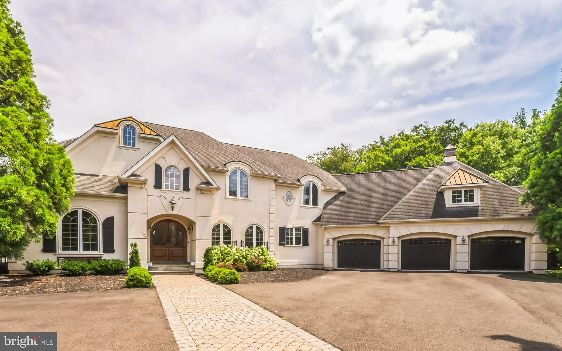 Welcome to this fabulous custom-built home in the sought after Greystone Development in Ambler/Horsham Township.  A gorgeous, curved wood door is the first of many unique features you will find in this stunning home. A gracious foyer with hardwood flooring welcomes you and is flanked by a home office and a formal dining room.  The spacious first floor home office has built-in bookshelves, 2 huge windows for lots of natural light, carpet and border in-laid hardwood floors. The formal dining room has stunning woodwork and ceiling, in-laid hardwood flooring and a French door to a private patio. The expansive foyer opens into a huge "Great Room" with custom wood ceiling, floor to ceiling windows, hardwood flooring and fireplace. This room is wonderful for everyday use and entertaining! The kitchen boasts granite counters, custom cabinets, tile flooring and stainless-steel appliances including a 6-burner range with pot filler and double oven and island with seating. The sun-drenched breakfast room is the perfect spot for morning coffee and has a door to a deck overlooking the backyard. The primary bedroom suite has a sitting room, bedroom, his and hers walk in closets and a spa like bathroom with stall shower and free-standing tub.  A first-floor laundry/mud room is a great drop zone for bookbags and sports equipment and has access to the 3-car garage. A formal powder room completes this floor.  The second floor has 2 en suite bedrooms with walk in closets and a large sitting room/second office with built-ins and a juliet balcony overlooking the foyer. The professionally finished full walk out basement has custom woodwork and everything you could want or need! There is a full bar area with seating, family room with gas fireplace and door to backyard, media/theater room with seating for 6, a bedroom with walk in closet and a full bath, an exercise room, game room with butler pantry area and wine fridge, a craft room and another full bath. If you have an au pair, need space for in-laws, college age kids or frequent out of town guests you will love this incredible space. The outside of the home is just as special as the inside and offers a private, fenced 1.57-acre lot with an inground pool and lots of space to enjoy the outdoors.   The incredible location is the icing on the cake! There is a walking trail around the development, and it is minutes to Whole Foods, Starbucks, Ambler YMCA, restaurants, shopping, movie theater, several golf courses/clubs, downtown Ambler and Ambler and Ft. Washington Train Stations, PA Turnpike and a short commute to center city. HURRY!!
