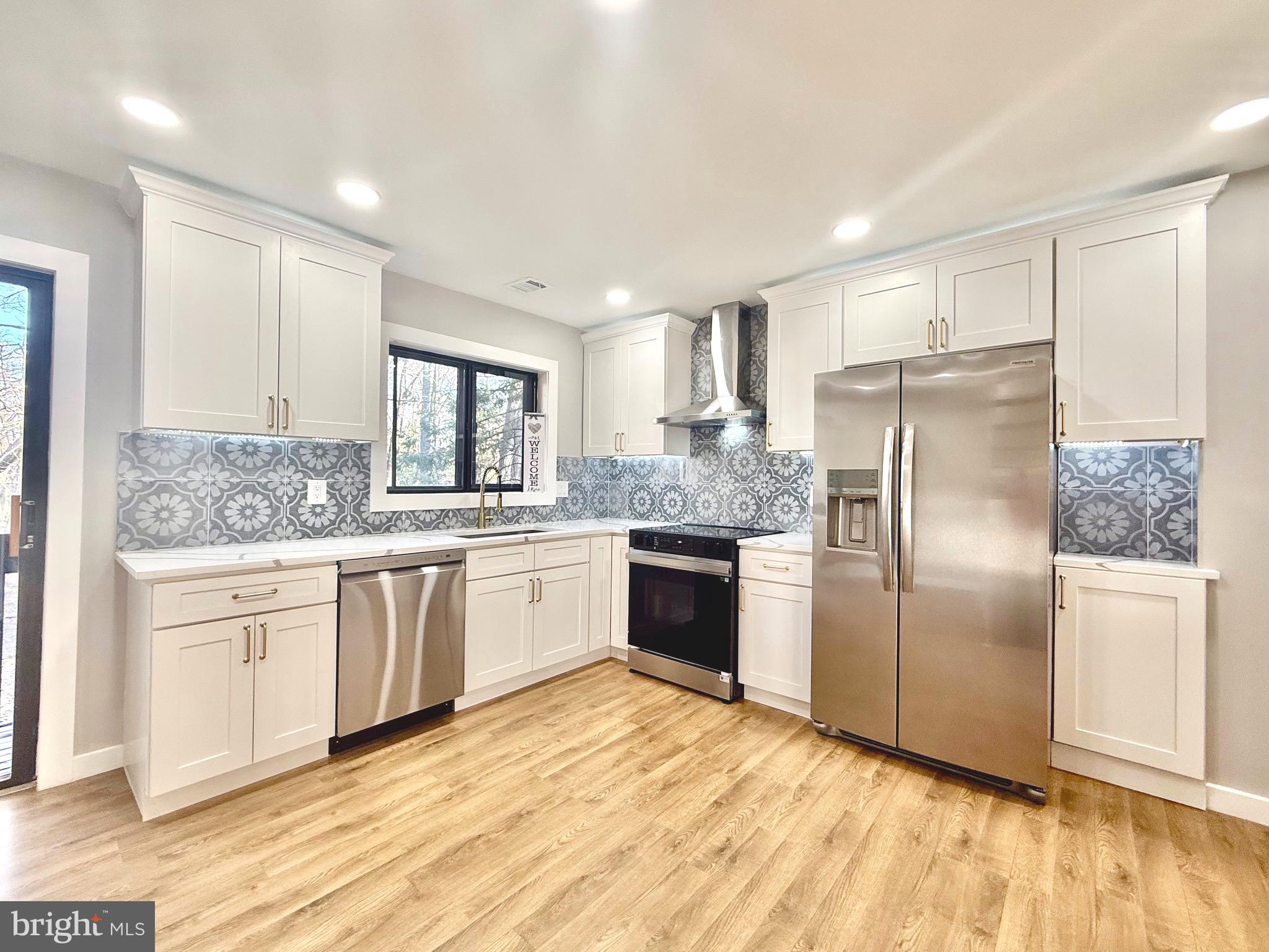 Newly renovated and move-in ready this modern 3-bedroom, 1.5-bathroom townhome is located in the highly desirable Sawyers Cluster of Reston. Designed for comfortable and modern living, the home features an open floor plan that maximizes space and functionality. On the main level, you'll find a bright and spacious living room, a dining area, a well-appointed kitchen, and a convenient half-bath. Upstairs, the primary bedroom boasts a walk-in closet, accompanied by a secondary bedroom and a full bathroom. The lower level adds versatility with a third bedroom—perfect for guests, a home office, or a private retreat. Nestled in a welcoming, family-friendly community, this home offers easy access to Reston’s fantastic amenities, including parks, trails, Reston Town Center, and top-rated schools. It’s a fantastic opportunity for those seeking both comfort and convenience!
