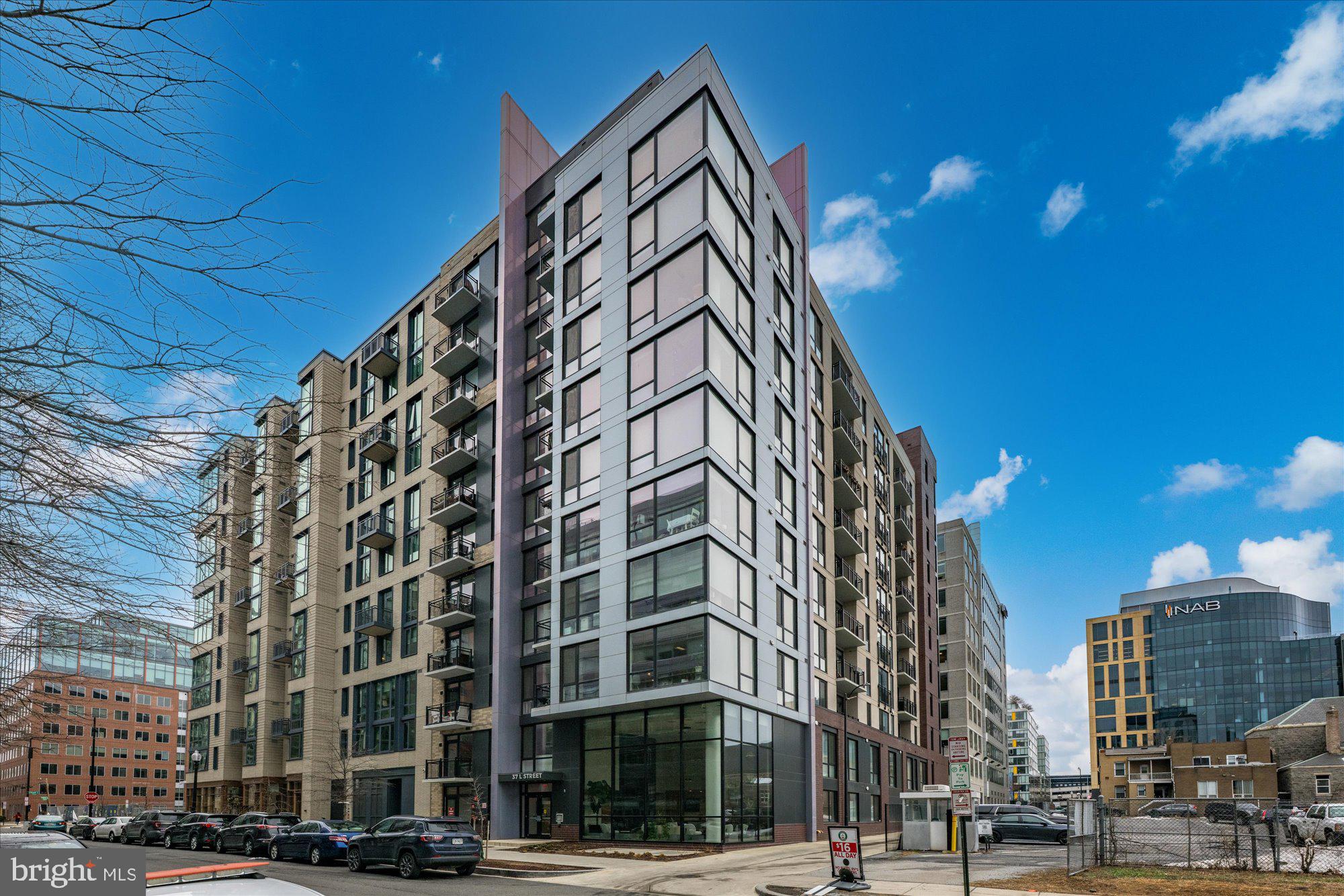 Perched high above the city in one of Capitol Riverfront’s most dynamic addresses, Residence 1105 at 37 L Street SE is a stunning one-bedroom, one-bath condominium offering elevated urban living with refined modern style.

Flooded with natural light from expansive windows, this thoughtfully designed home features an open-concept layout that maximizes both comfort and functionality. Wide-plank flooring and clean architectural lines create a sleek backdrop for everyday living and entertaining alike. The contemporary kitchen is appointed with stone countertops, modern cabinetry, and stainless steel appliances, flowing seamlessly into the living and dining space.

The spacious bedroom provides a quiet retreat with generous closet storage, while the well-appointed bath showcases sophisticated finishes and a spa-inspired feel. Whether you’re enjoying morning coffee with city views or unwinding after a long day, this residence offers the perfect balance of energy and escape.

Residents enjoy access to premium building amenities and the convenience of a professionally managed, amenity-rich community just moments from Navy Yard’s waterfront parks, acclaimed restaurants, Nationals Park, Whole Foods, Metro access, and countless neighborhood conveniences.

Stylish, turnkey, and ideally located, 37 L Street SE 1105 presents an exceptional opportunity to own in one of Washington’s most vibrant and rapidly evolving neighborhoods.