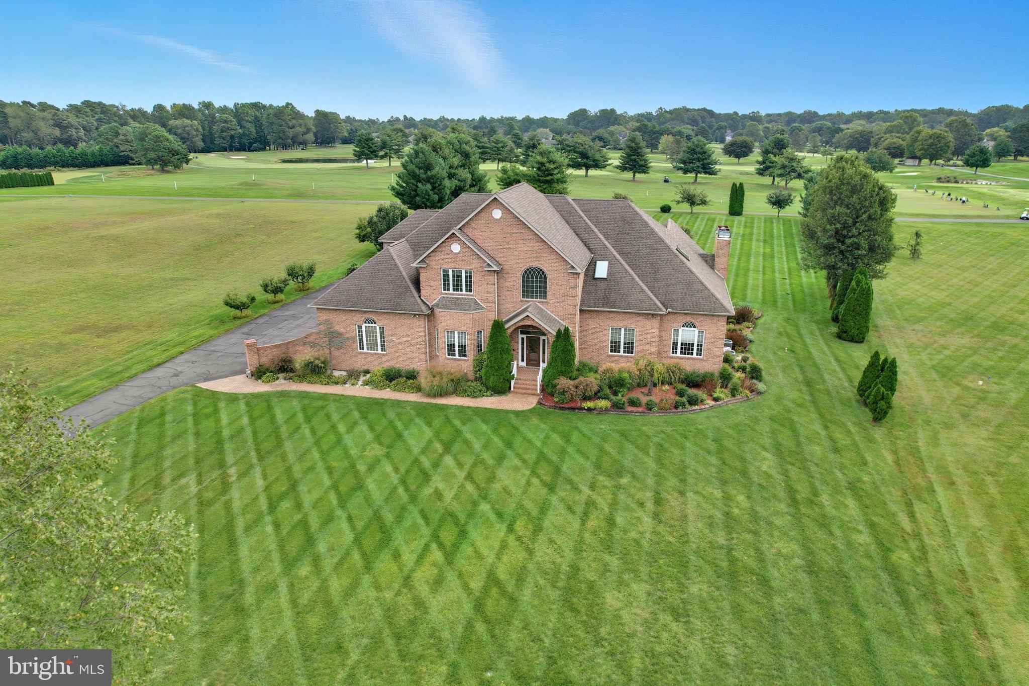 NEW PRICE!! Prepare to be amazed…Introducing a truly exceptional luxury home in one of Delaware’s most prestigious neighborhoods — the Village of Wild Quail. This all-brick estate spans over 7,500 square feet of exquisitely finished living space, set on 1.62 acres of manicured grounds adjacent to the renowned Wild Quail golf course.
From the moment you enter, the home impresses with its 12-foot ceilings throughout the main level, rich hardwood flooring, and a fully open floor plan that blends architectural grandeur with effortless flow. The kitchen is a chef’s dream, featuring premium appliances, expansive prep space, and seamless access to the adjacent three-season room—perfect for relaxed mornings or elegant entertaining.
Designed for both luxury and livability, the layout includes five expansive bedrooms and five and a half baths, including two main-level suites with private baths—ideal for guests or multi-generational living. The upper level offers three additional oversized bedrooms and two full baths, each appointed with refined finishes.
A private sauna, located on the main level, offers a dedicated space for wellness and restoration. This home also includes a massive, fully finished basement with a full bath and wet bar providing endless possibilities for recreation, entertaining, or future customization.
Every inch of this masterpiece reflects thoughtful craftsmanship and elevated design. This is not simply a home — it’s a rare opportunity to own a property of unmatched scale and sophistication in a coveted golf course community. Homes of this caliber are seldom available. You will be blown away...schedule your tour!