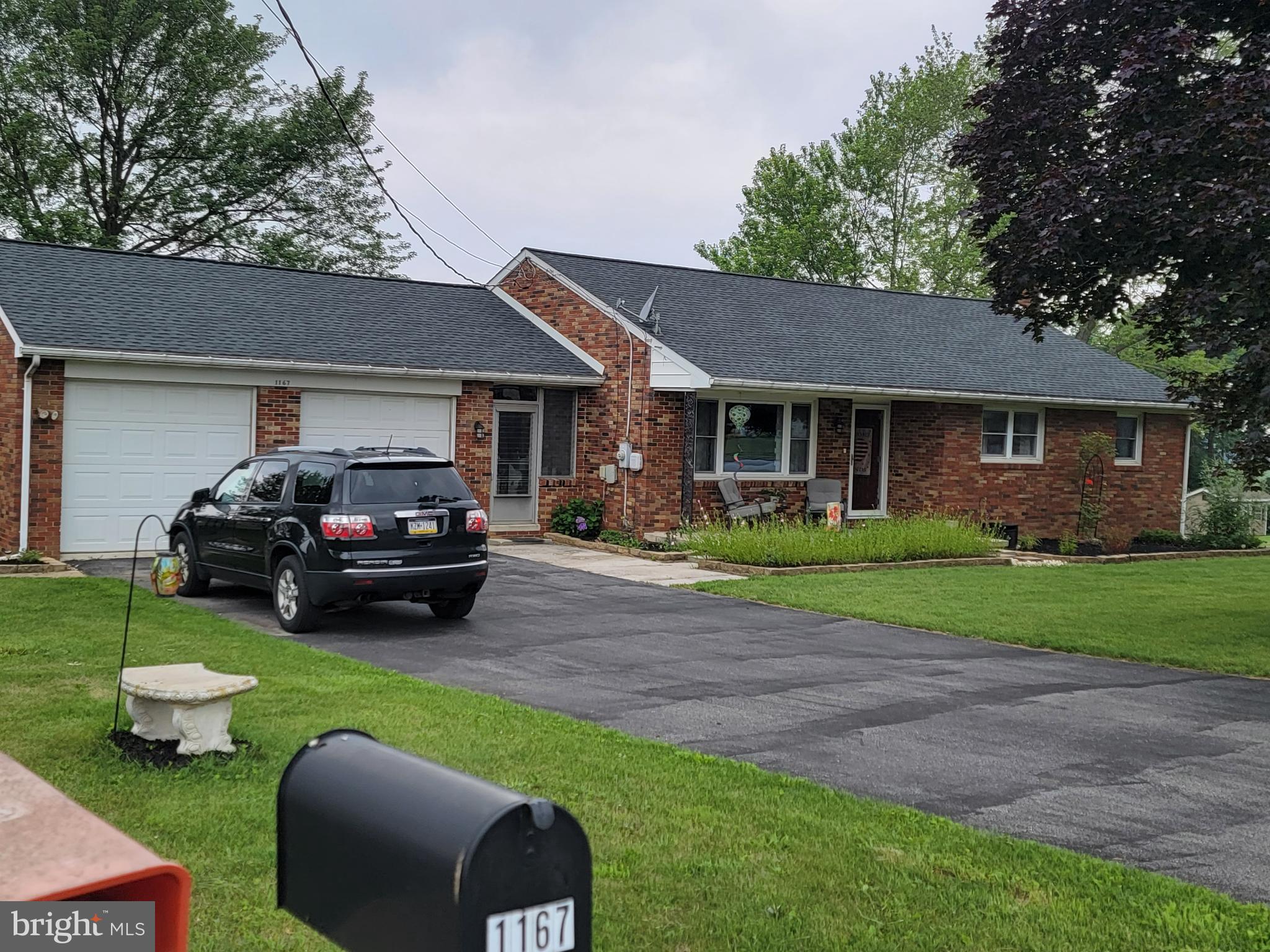 What a gem you will find in this well-maintained home on almost a full acre of manicured level lawn. Private septic, private well with all four-sided brick ranch, two-car garage with an enclosed breezeway attached to the house on one side and the garage on the other. Three bedrooms, two full baths, separate dining room /area, partial finished lower level with a walk out basement with a full bath and a lower- level laundry. Oversized living family room in the lower level as well as a workstation. New hot water heater, well pump, all new windows, bathrooms remodeled. new Lennox Central Air/Heat Pump with natural gas, oversize escape window for the finished family room, new shingled room, beautifully landscaped, outside deck recently painted for outside enjoyment.  Not to mention the second floor is a full attic that could be finished into additional living quarters. Newer stove, dishwasher and fridge will go with the home.   What are you waiting for? These buyers made this a turnkey property and priced just right.