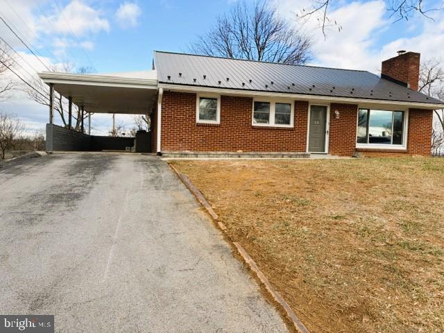 Hello, JUST BIG PRICE IMPROVED- FOR YOU-WELCOME HOME! Don’t miss this great NICE UPDATED-home, with an update combo Kitchen,  New Appliances, Bathrooms and Basement. This is a great deal for first time family! Bring your best offer! This brick rancher offers 5 nice size bedrooms, Main level with a  large living room with beautiful new floors and stunning fireplace. 2 bedrooms, 1 full bathroom with glass shower door, 1 haft bathroom, closets. Full finished basement with 2 large bedroom, 1 full bathroom with glass door shower, extra space. Laundry room.  Large Yard. As further as this conveniently located brick rancher has recent upgrades such as a new slate roof, gutters, new Stone Paver Patio and under slab sewer line replacement in 2024! NO CITY TAXES! Just minutes away from interstate 70, this is a commuters dream! This home has tons of storage and potential with over 1200 square feet of living space on the main level. Driveway and Carport.  Close to shops and transportation. Call Elena with questions.   This is your dream home! Owners say Thanks for your interest.