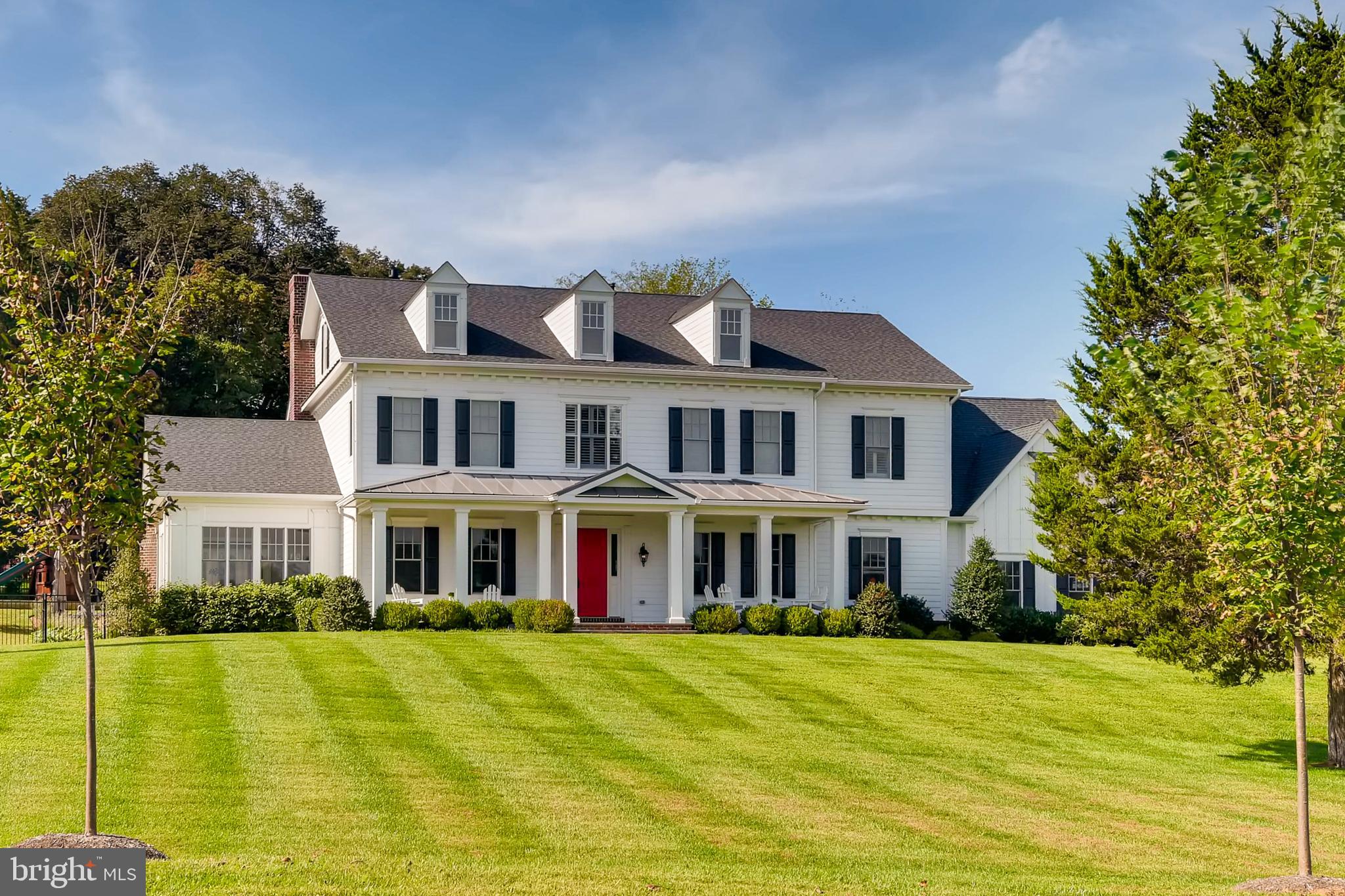 This stunning custom built Goodier Baker home is truly exceptional inside and out. Enter from the gracious front porch into a wonderful open plan first floor. The Living and Dining rooms flank the entry. An awesome Great Room and Chefs Kitchen stretch across the back of the house. The kitchen features two dishwashers, coffee, beverage, and wine areas, and a fabulous island. A study/bedroom with a full bath, a sunroom, half bath, and mudroom complete the first floor. The second floor features 5 en-suite bedrooms and a large laundry room. The expansive Master Suite with spa-like bath includes an oversized custom closet, free-standing tub, and double shower and porcelain tile. The lower level with walk-up access to the rear yard includes a game room with a full wet bar and kitchenette with microwave, dishwasher, sink, beverage refrigerator, ice maker and wine refrigerator, a wine cellar with tasting area, professional home theater, and a guest suite. The fully fenced and professionally landscaped rear yard was designed for outdoor living. It features a heated salt pool with waterfalls and sun shelf, built-in hot tub/spa, retractable cover, and heated pool house with half bath, changing rooms, and laundry, and storage, a full outdoor kitchen, a covered verandah with fireplace, fenced vegetable, herb, and flower gardens, and a wonderful stone patio. LED lighting, a whole house audio system, whole house home automation wiring and switches, home security system complete the package. This truly amazing home is in mint condition. Worthington Green is convenient to Baltimore, Foundry Row and Hunt Valley shopping and restaurants, and many of Baltimore Counties finest private schools.
