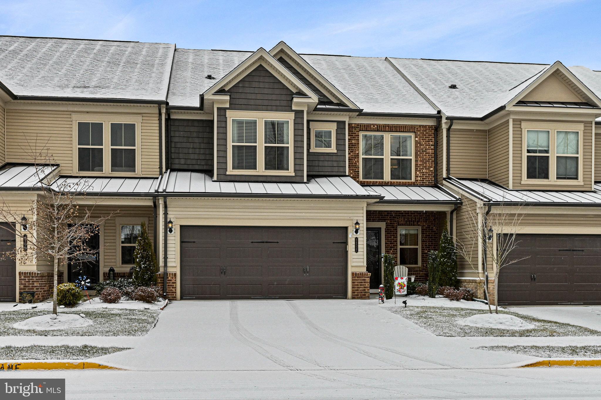 Welcome to Lexington, Loudoun's Premier Active Adult 55+ community! This perfect 3 Bedroom, 2. 5 Bath  Aston model with 2 car garage is going to make you smile from ear to ear! The original owner added almost every luxury upgrade when this home was built in 2019! This townhouse is simply perfect. You will greet your guests on an oversized covered front porch . This home is great for entertaining with its gourmet kitchen with stainless steel appliances, granite counters, upgraded cabinets with under cabinet lighting. The large oversized kitchen island has pendant lighting and you will find a pantry for excellent storage. Light and bright dining room area and family room with grand coffered ceilings. Walk-out back to beautiful patio for outside entertaining and relaxing. The main level primary bedroom has a tray ceiling, crown molding,  and ceiling fan. The luxury primary bathroom has granite counters, dual sinks and an oversized shower. The main level has lots of beautiful hardwood floors. There is also a den/office/flex space on the main level. The upper level offers a large loft space/2nd family room and  two spacious bedrooms with walk-in closets and ceilings fans. There is an additional full bathroom with dual sinks and upgraded countertops. You will love  the extra large storage room on the upper floor as well! The main level laundry room includes a washer/dryer and cabinets for storage. The two car garage has overhead storage shelves and a brand new epoxy painted floor.  There is lots of guest parking throughout the neighborhood  - and you will love the walking trials and the multi-use court! Walk to shopping center/restaurants. Enjoy close-by One Loudoun, University Center, Belmont Chase, Lansdowne and Downtown Leesburg, the many local wineries/craft breweries/ farms, hiking as well as the W&OD trail. Easy access to Routes 7 and 28, Dulles Airport and the newly opened Silver Line Metro. There is so much to love here!