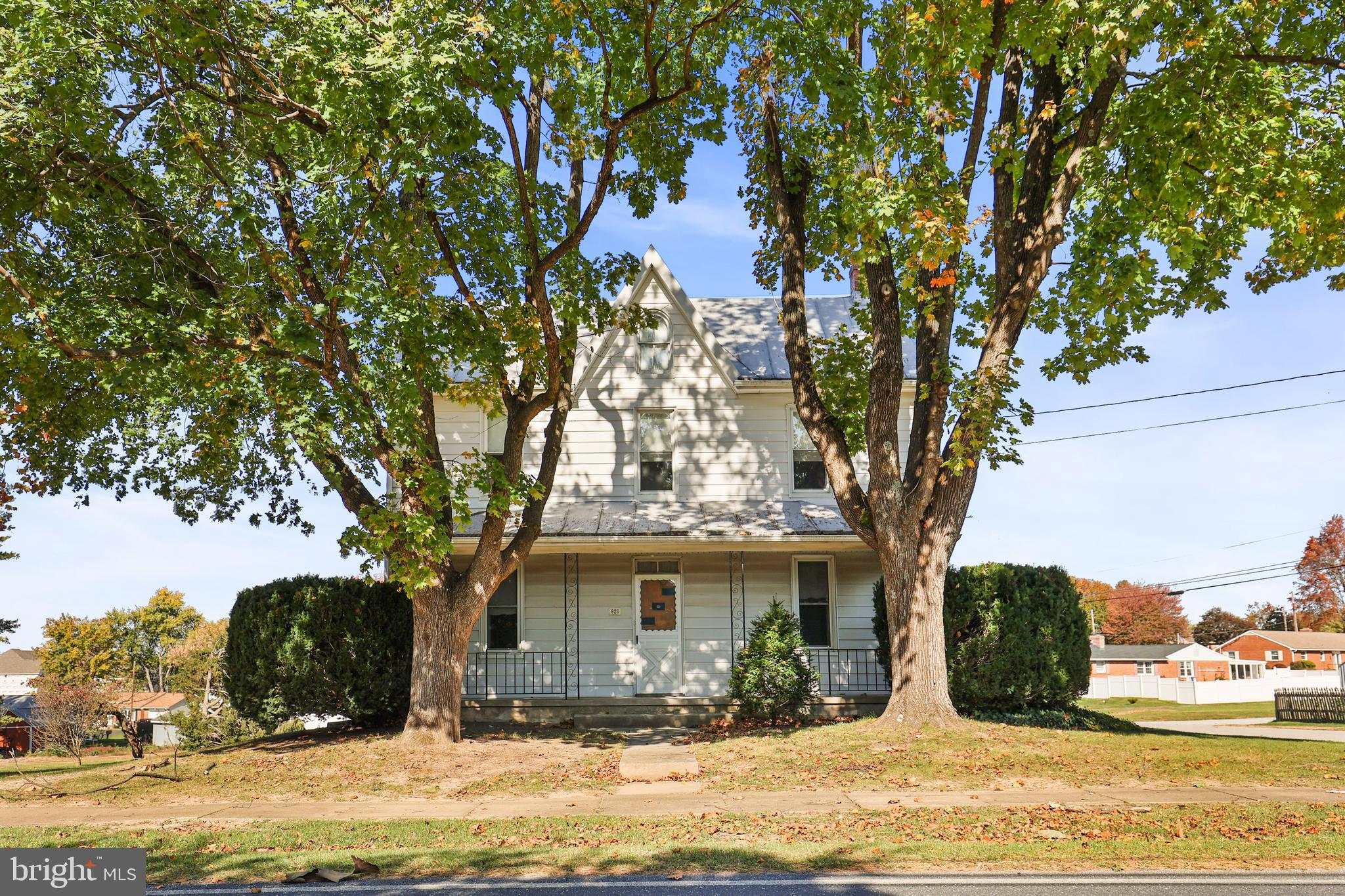 Investor Special 3BR/2BA single family home located on a spacious lot in a quiet neighborhood of Hampstead. The main floor offers a large bedroom and cozy entry/sitting room with  a spacious living room, and kitchen. Upstairs you'll find 2 large bedrooms and a full bathroom. From the main floor step outside to a covered porch that overlooks the yard offering tons of green space, and two large garages. Endless options for the car enthusiast!! Located in close proximity to shopping, restaurants, and commuter routes.