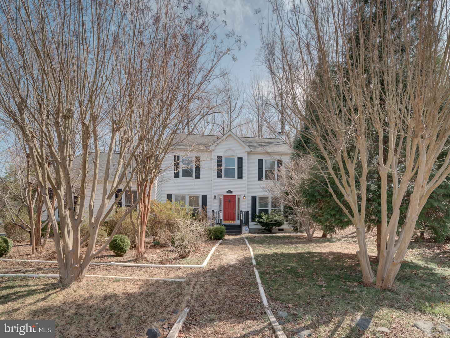 Welcome to your serene retreat in Aquia Harbor. Take advantage of the numerous community amenities offered by this meticulously maintained colonial-style home situated on a 0.72-acre lot. It's move-in ready with neutral color schemes and gorgeous hardwood flooring throughout the main level. The property includes a spacious family room featuring a semi-open layout and a cozy wood-burning fireplace, perfect for enjoying the views of the trees in the backyard and entertainment area. The first floor is completed by a formal dining area, an office space, and a laundry room. Upstairs, the generous primary suite boasts high ceilings, an ensuite bathroom with double sinks, and a walk-in closet. Additionally, there are two more sizable bedrooms and a full bathroom with a tub on the upper level. This home provides ample storage, including an oversized attached 2-car garage with a designated storage area and a large driveway. Don’t miss out on this bright and inviting home—schedule your tour today!
 There is a $1,500 association move in fee for tenants.