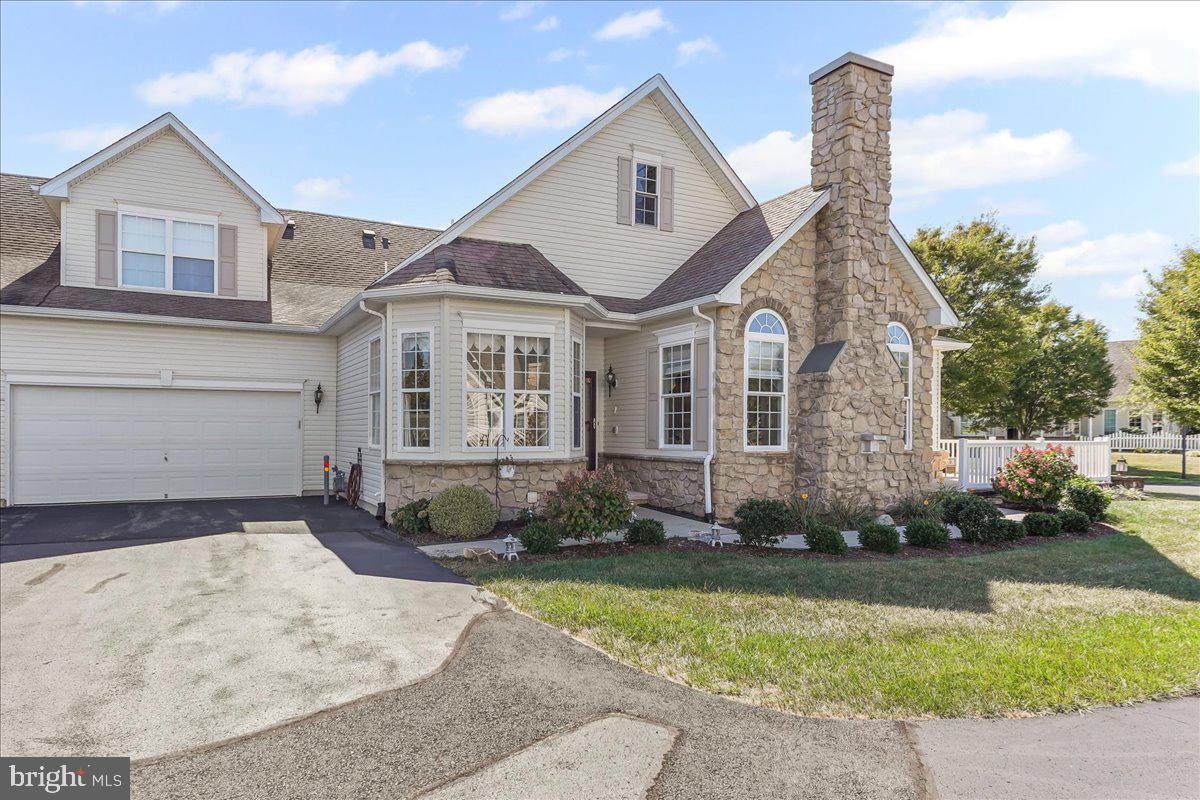 Exquisite Townhouse, pride of ownership meticulously maintained, in the most desirable The Vineyards 55+ community.  2,000 SF of great  living space, surrounded by walking trails, putting green, playgrounds, and a resident clubhouse with  game room, library, exercise equipment, and more! The first floor features an elegant living room and formal dinning room, that opens into to the kitchen,  with an additional breakfast area. A most convenient  powder room for your guests use, and  your first floor laundry , steps away from the  spacious  primary bedroom, with  en suite and great closets space. An additional first floor room, currently used as an office, with French doors access to the fenced in outdoor terrace, boasting natural light, and with high ceilings through out. Second floor bedroom, with its own very spacious closet and full bathroom, and  fully finished basement, with an extra bedroom and full bathroom as well.  Dedicated shop space, and  recreation room, . Two cars attached garage  with direct access to the first floor.  Plenty of activities in the club house, including billiards, card games, crafts, tea parties and social gatherings in the grand room, and a well equipped gym for all your fitness needs. Bingo night, line dancing, book, travel and photography clubs. This property can only be described as  perfect for your peace of mind and enjoyment!