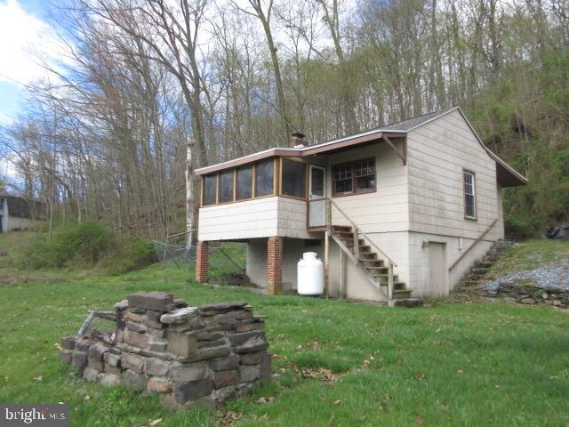 Explore the potential in this 2-bedroom, 1-bath bungalow nestled on 0.30 acres in the heart of Perry County. Built-in 1940 and offering 779 square feet of living space, this home features oil forced-air heat, well water, and a septic system. While it does need updating, it presents a fantastic opportunity for the right buyer—whether you're looking for a peaceful weekend getaway, a rental investment, or a cozy hunting camp. The property is being sold as-is, as it sits. Cash offers only. Come envision the possibilities!

Buyer uses Premium Title Services, the seller’s preferred title partner and closing agent. This lets the buyer bypass the title insurance fee, related search costs and reduced escrow/settlement fees, since the seller will cover those charges. The average charges for title search and insurance is $1225 & escrow/settlement fees is $875, resulting in an overall savings of  $1660 for buyers, who opt for Premium Title Services.