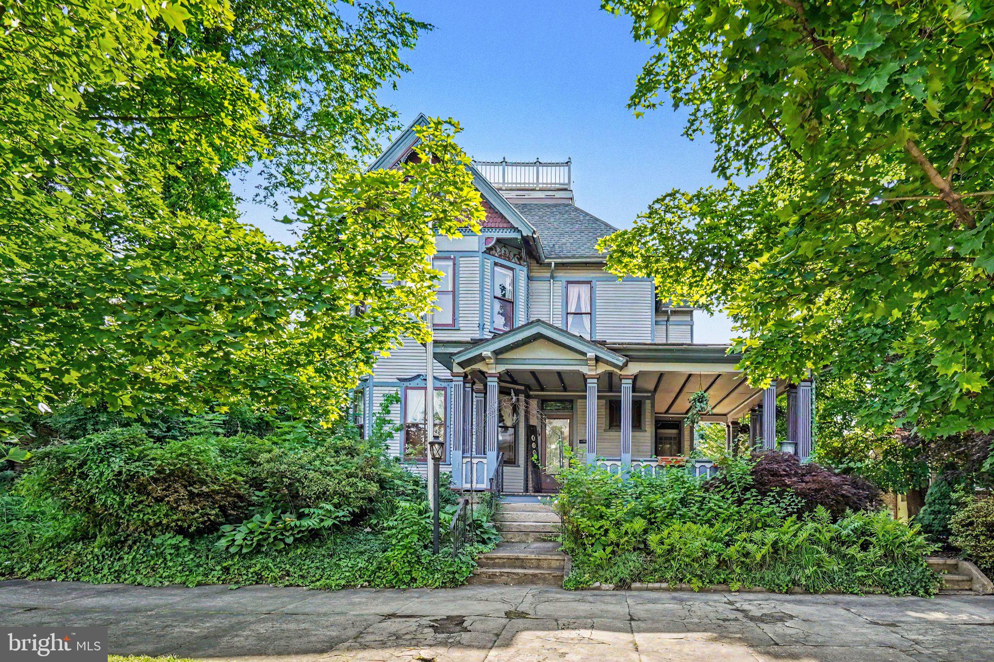 Step back in time and experience the charm and character of this beautiful 4-bedroom, 1.5-bath Victorian home located in the heart of Millersburg! From the moment you arrive, you’ll be welcomed by the inviting front porch, perfect for relaxing and enjoying the neighborhood atmosphere. Inside, you’ll find character throughout, featuring original hardwood floors, a spacious living room with a cozy fireplace, a formal dining area, and an updated kitchen that blends modern convenience with timeless appeal. The generously sized bedrooms provide plenty of space, while the updated bathroom offers both a walk-in shower and a bathtub. Additional highlights include an upper-level porch, a wine cellar, detached garage, off-street parking, and extra storage space. Step outside to enjoy the spacious backyard, perfect for entertaining, gardening, or simply unwinding. Take in breathtaking views of Millersburg from the third-floor rooftop patio, an incredible space to relax, entertain guests, or enjoy your morning coffee while overlooking town.
Conveniently located within walking distance of local restaurants, parks, the Susquehanna River, a movie theater, and charming downtown shops, you’ll love having the best of Millersburg right at your doorstep.
This one-of-a-kind Victorian home offers the craftsmanship and charm that is hard to find in today’s homes. With timeless architectural details, modern updates, and unique features throughout, this property is truly a rare find. Schedule your private showing today and see for yourself—because they truly don’t make them like this anymore!