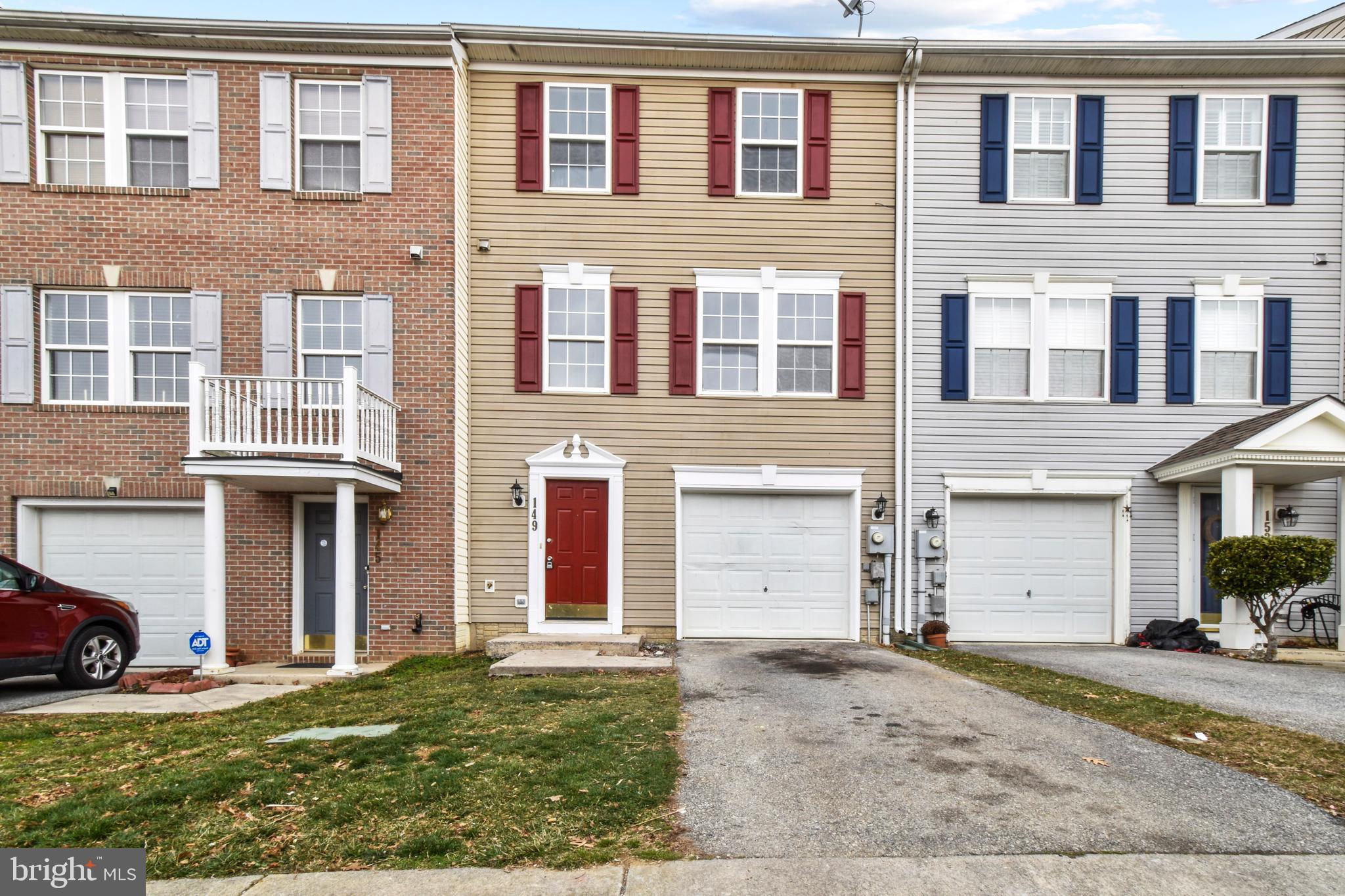 You are so lucky to have an opportunity to own this townhome w/ new hardwood floors, plush carpet, don't let  the new blinds fool you,  entire home painted, floored, and in turn key condition.  Lets visit the renovated baths with vinyl, bedroom in basement, the exciting modern lighting throughout this sought after home.  New decking, new HVAC, and new appliances should make this your first choice today!