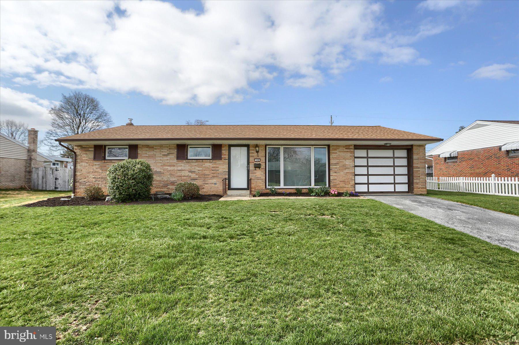 Welome to this charming brick ranch home in Windsor Park.  Featuring a unique sunken living room. Dining Room opens to kitchen and living room. All appliances included. Beautiful hardwood floors, updated carpeting. The sunroom provides a peaceful retreat with natural light pouring in, creating the perfect spot for morning coffee or evening relaxation. The home sits on a level yard with a patio, offering plenty of space for outdoor activities or gardening. Three bedrooms and full bath on main level. Primary bedroom also includes a half bath. Roof recently updated in 2020. Basement provides plenty of storage.  One car garage and off street parking. Convenient location close to shopping, dining, Rt 15 and the Turnpike.