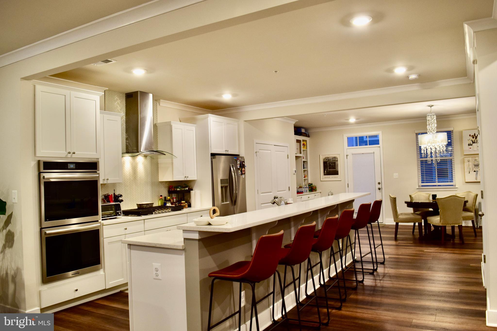 Stunning 2-Year Young Luxury End-Unit Townhouse style Condo in Prime Elkridge Location. 
Enjoy low-maintenance luxury living in this spacious   2500 sqft upper-level home! Perfectly situated off Rt. 1 with immediate access to I-95, Rt. 100, and Rt. 175, and shops this home is a commuter’s dream. Flooded with natural light, the open-concept main level boasts a gourmet chef's kitchen with upgraded appliances and designer finishes, seamlessly flowing into the dining and family rooms. Features 3 generous bedrooms, 2.5 bathrooms, and a 1-car attached garage with a Tesla charger. Experience modern, stylish living in Howard County. Agent is owner. List price is $28K below Howard County assessment!