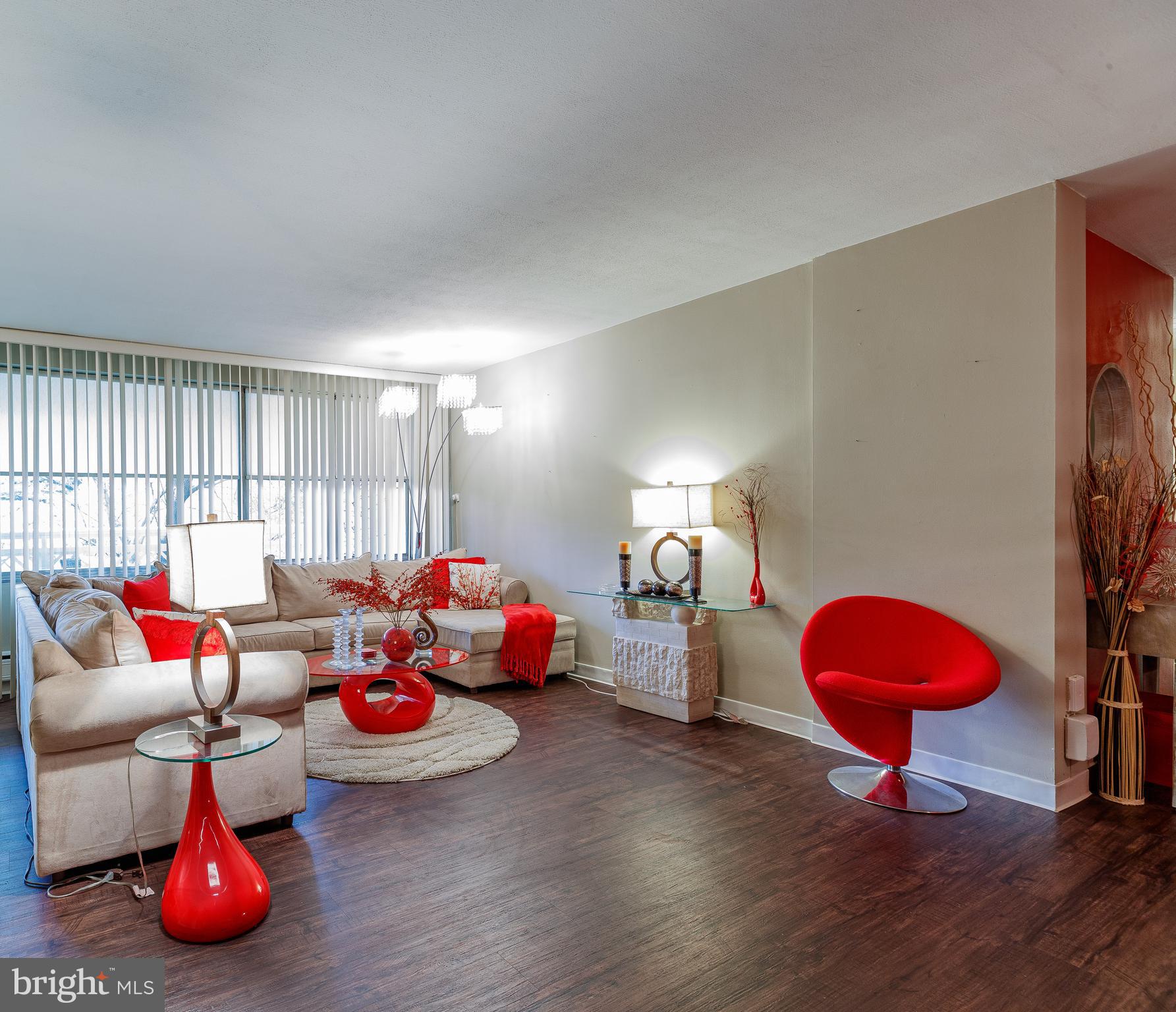 Welcome to this stunning and tastefully furnished condo that effortlessly combines elegance and comfort. As you step inside, you'll be greeted by an open living space, adorned with beautiful wood floors that create a warm and inviting atmosphere. The living area not only boasts a cozy ambiance but also features a bar, perfect for entertaining guests. The adjacent dining area is ideal for enjoying meals with loved ones. The galley kitchen is equipped stainless steel appliances. With two bedrooms, you have the option to retreat to the spacious bedroom, offering tranquility and relaxation, or indulge in the large primary bedroom that boasts a walk-in closet and an ensuite. An additional bathroom ensures convenience for both residents and guests. Step outside onto the patio, a serene oasis with plenty of space for outdoor living and creating beautiful memories. This condo is available for sale fully furnished, allowing for a turnkey and hassle-free living experience.
