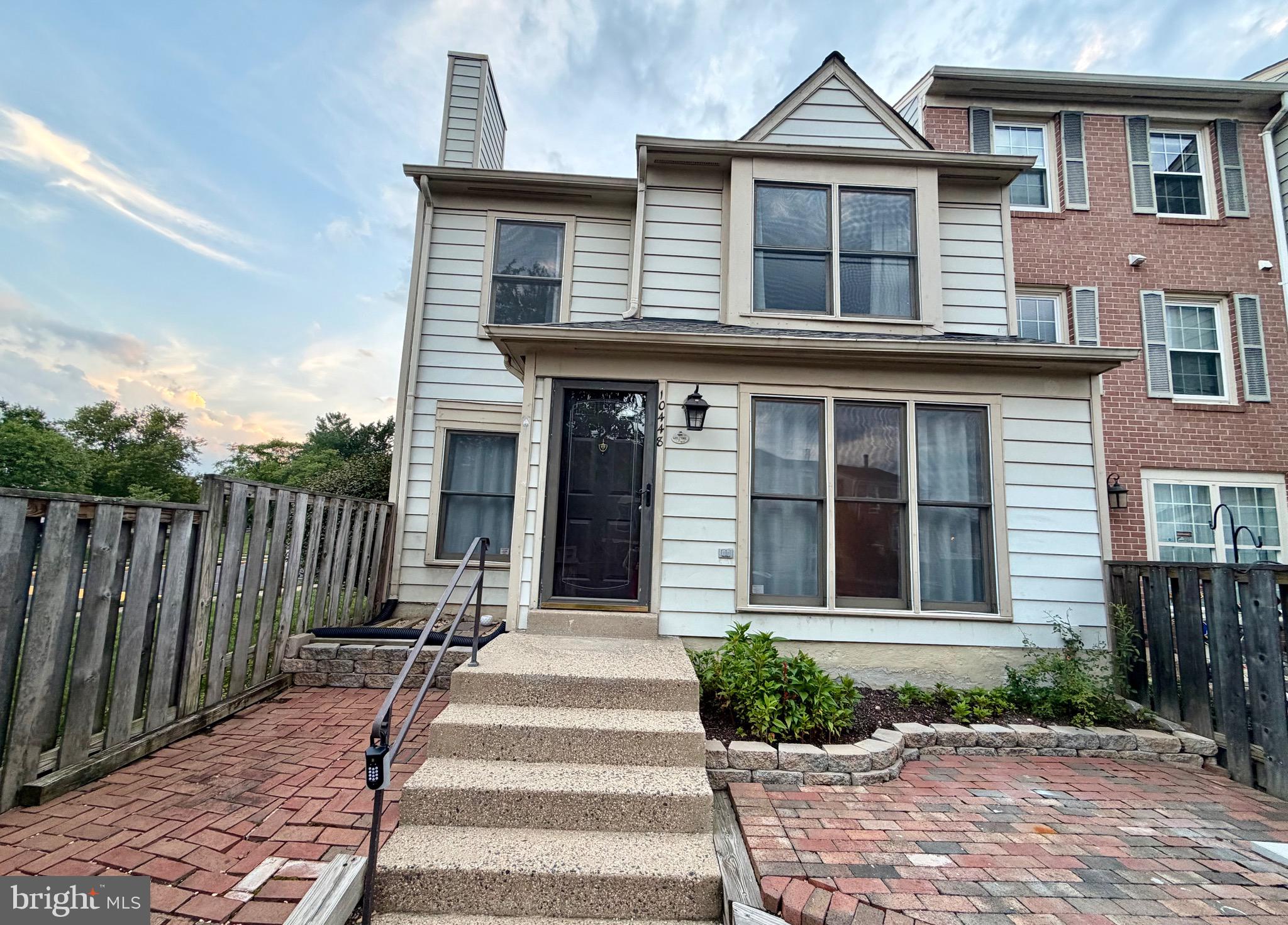 Gorgeous 3/or2 BR, 2 BA Townhouse Condo offers a perfect blend of comfort, style, and convenience in a desirable neighborhood of living in Manassas.  **  This home has 2 assigned parking spaces right in front of the home. ** As you enter the inviting and expansive living room, with large windows, floods the space filled with natural light, creating a warm and inviting ambiance.  On Main Level:  Open the living room to the dining area, making it perfect for entertaining.  **The Kitchen features white painted cabinets, New LVP Flooring, granite countertops, a smooth-top electric stove/oven, newer range hood 2025 - vented to outside.  A large Bedroom/Family room on the main level with a wood-burning fireplace, computer station, and a closet, and access to a full bath.  **Moving upstairs, you will find an open loft is generously sized, can be use as sitting area/office/or guest bedroom, large windows filled with natural light, providing plenty of space for relaxation and rest.  The huge primary bedroom with large windows filled with natural light, two standard closets and access to a full bath.  The spacious 2nd bedroom is next to Primary BR, has two windows.  ** You will love a spacious attic storage. ** This home has front patio, landscaping, shed/storage and front gate entrance, ideal space for outdoor activities and gatherings in your spacious front yard.  The community offers fantastic amenities, including a large swimming pool, multiple playground areas, and ample sidewalks for leisurely walks.  **Close to shopping, restaurants, and much more.  Quick access to I-66, Rt-234, Rt-28, makes commuting a breeze, and accessing anywhere in Northern Virginia is relatively easy.  ** New Water-Heater 2025, New Toilets  2024, New roof shingles 2024, New Flooring on 2nd level 2024, New Painted through-out the house 2024,  New LVP Flooring in Kitchen and Bathroom on Main floor 2025. **CONDO take care of all exteriors including all wood trims.  **Very Nice and Clean Home.  A Must See!!!