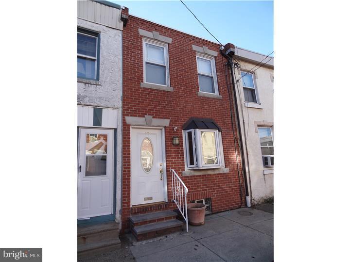 Great home in an excellent location!!! This is a 2 bedroom house with hard wood floors throughout the first floor and a beautifully exposed brick wall. There is an open updated kitchen with a breakfast bar overlooking the dining room. Large back yard space for BBQing and entertaining. Upstairs are 2 bedrooms and an updated bathroom. Property has Central Air, heat, washer and dryer. Also a newer front brick facade and a brand new water heater. This property is extremely close to shopping, transportation, Girard Ave and I-95. Also very nearby Restaurants such as Kraftwerk, Johnny Brendas and Frankford Hall.