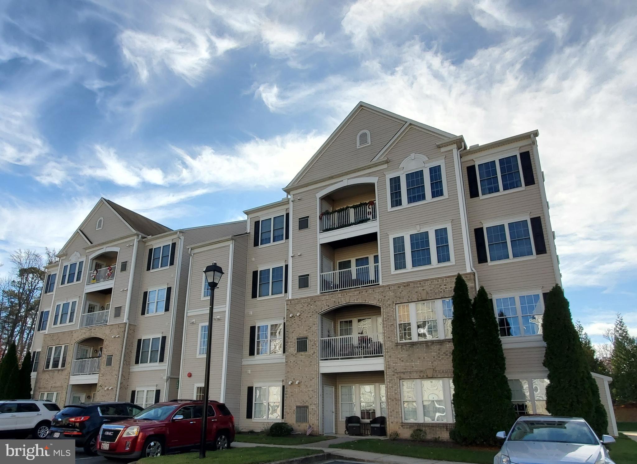 55+ community with elevators in each building. Sunny, bright, TOP floor condo. Approximately 1650 sq feet with 2 bedrooms with 2 full baths. Gourmet kitchen with granite counters, dual wall ovens, built in cutting board (never used - still wrapped in plastic!), gas appliances, double closet for the pantry, low maintenance flooring, ample room for a table and chairs.  Living Room opens to the dining room that has crown molding and chair rail. Primary bedroom has an attached seating area that could be used as a den and an en suite bath with double vanity, ceramic tile, and shower with a seat.  Second full bathroom opens to the second bedroom and the living room and has a walk-in tub with light and aroma therapy.  There is plenty of storage - the primary bedroom has a walk-in closet, double closet in the second bedroom, double closet in the entry, and a storage room off the entry as well. The unit was designed for easy wheelchair access with lower mirrors and light switches. Within a 45 minute drive of the PA and DE state lines, Randallstown, Ft Meade, Millersville and everywhere in between!