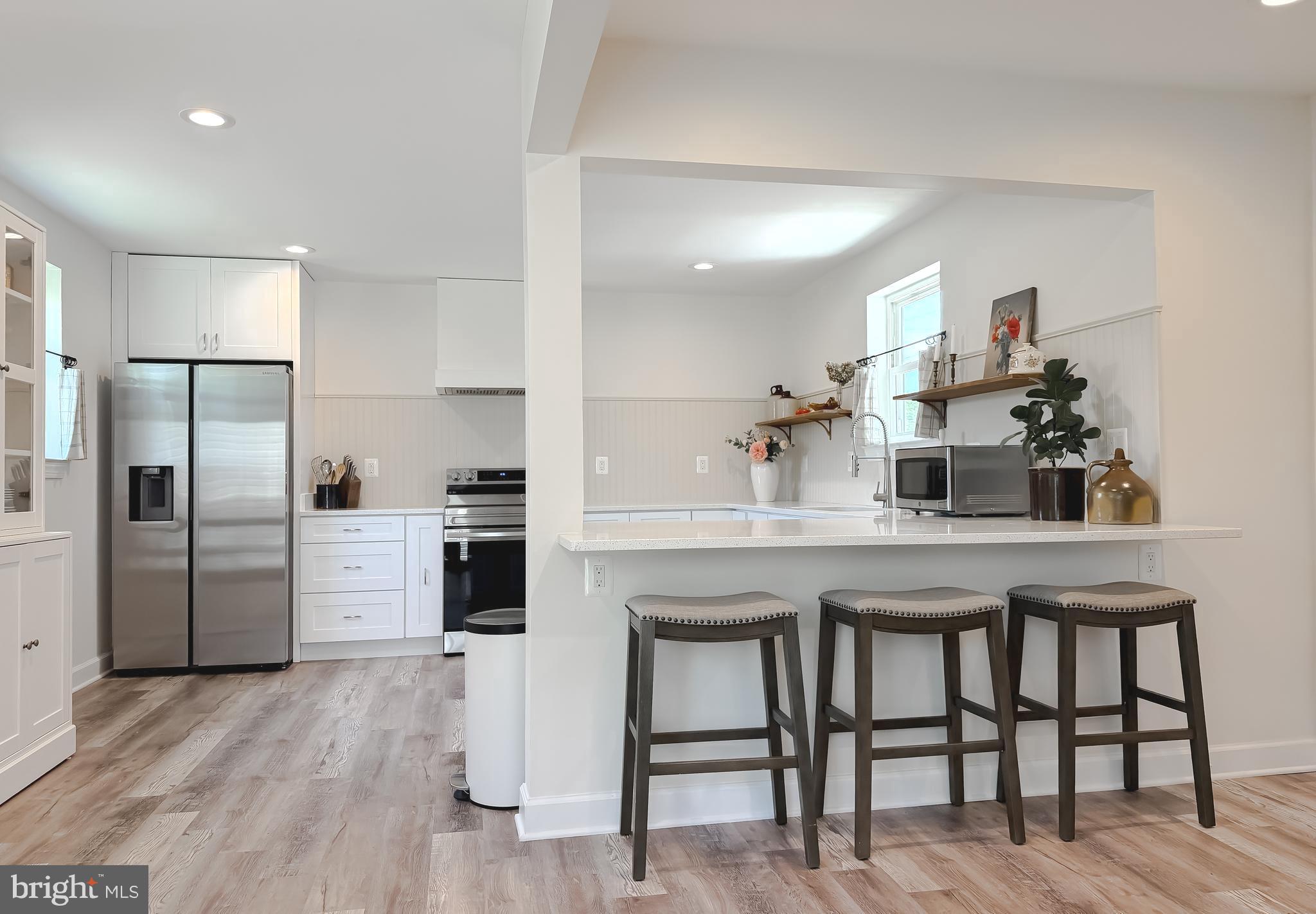 New Price! Exceptional Value in Huntingtown.

Now offered at $524,900, this beautifully renovated home offers an incredible opportunity to own over 3,600 square feet of finished living space on 2.4 acres in the highly sought-after Huntingtown school district—with NO HOA.

Completely remodeled in 2022, this move-in-ready home blends modern updates with timeless charm, allowing you to move in and simply enjoy. Nearly every major system has already been replaced, including the roof, HVAC, septic system, plumbing, electrical, water heater, flooring, kitchen appliances, and more—giving today's buyers the confidence and peace of mind they're looking for.

Outside, the property offers endless possibilities. Spend evenings on the spacious patio, enjoy the beautifully landscaped yard or grow your own vegetables in the irrigated garden.  Mature trees create a picturesque setting, while the absence of an HOA gives you the flexibility to truly make this property your own.

Additional improvements include a vapor barrier and crawl space insulation, a multistage water filtration and softening system, and a 2025 survey already completed.

Conveniently located for commuters to NAS Patuxent River, Joint Base Andrews, Annapolis, and Washington, D.C., this home offers the perfect blend of country living and accessibility.

If you've been searching for a home where the expensive updates have already been completed, on acreage, in one of Calvert County's most desirable school districts, this is one you won't want to miss. Schedule your private tour today and experience everything this exceptional property has to offer.