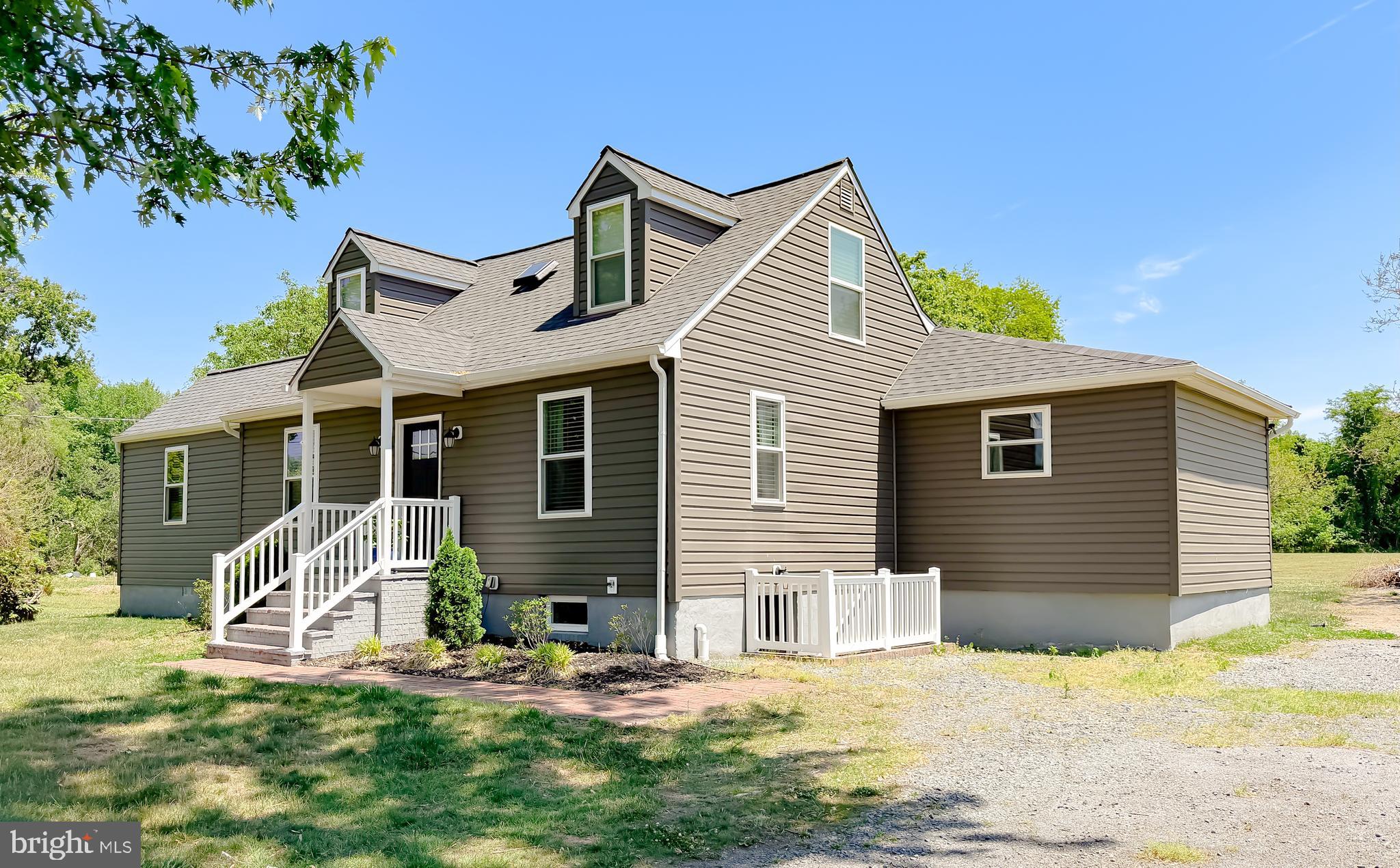 Welcome to 4985 Solomons Island Road.  Completely renovated in 2022, this move-in-ready home offers the perfect combination of modern updates, timeless character, and everyday functionality—all on a beautifully landscaped 2.4-acre lot in the highly sought-after Huntingtown school district.

With over 3,600 square feet of finished living space, this home offers room to spread out, entertain, and enjoy. Extensive renovations—including a new roof, HVAC, septic system, plumbing, electrical, water heater, flooring, kitchen appliances, and more—provide the peace of mind today's buyers are looking for.

Step outside and enjoy a property designed for every season. Relax on the spacious patio, gather with family and friends, tend to the irrigated garden, or simply enjoy the privacy created by mature trees and beautiful landscaping. The property also includes a barn that conveys as-is, offering excellent storage, workshop, or hobby potential. With no HOA, you'll have the freedom to truly make the property your own.

Additional improvements include a vapor barrier and insulation in the crawl space, a multistage water filtration and softening system, and a 2025 survey. Conveniently located with easy access to NAS Patuxent River, Joint Base Andrews, Annapolis, and Washington, D.C., this home offers the perfect balance of peaceful country living and commuter convenience.

Beautifully renovated, thoughtfully updated, and move-in ready, this is a rare opportunity to own a home where the major work has already been done. If you've been searching for acreage, top-rated schools, and exceptional value in Huntingtown, this home deserves a place at the top of your list. Schedule your private showing today!