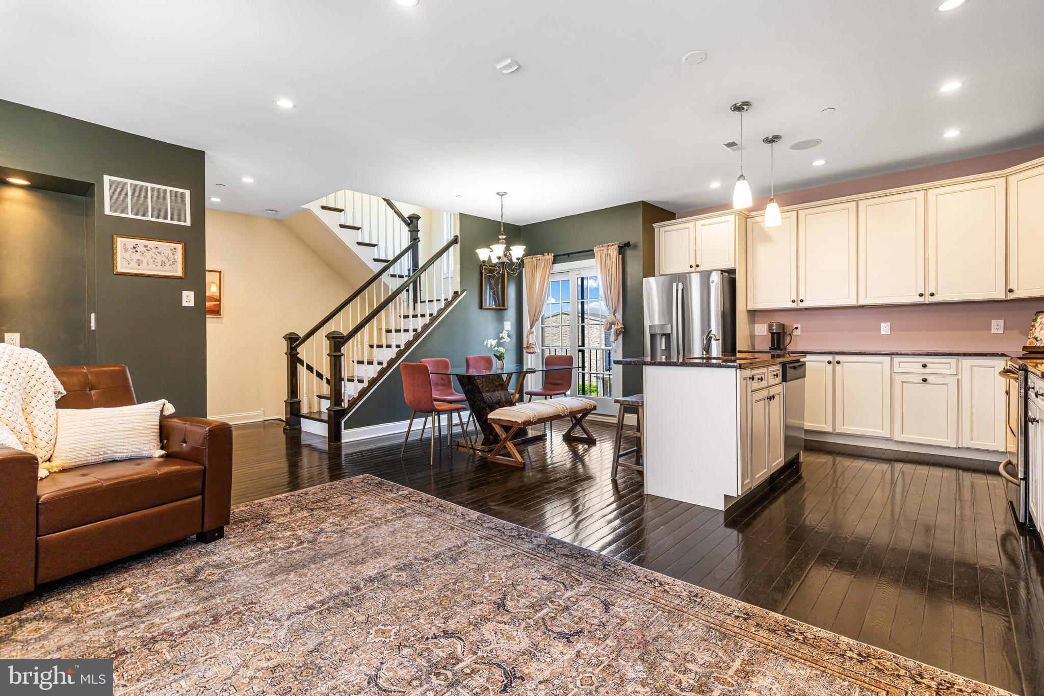 Welcome home to 308 Dupont St a beautifully maintained home in the vibrant Manayunk/Roxborough neighborhood. This expansive home offers 3 spacious bedrooms, 2.5 bathrooms, 2 car garage and multiple balconies. The home is illuminated with natural light and hardwood flooring throughout. The first floor gives you a warm welcome to the house. You have inside access to your extra large 2 car garage and bonus outdoor space as well as some extra storage space. On the main floor you will find an open floor plan with 9 ft+ high ceilings and  an abundance of natural light. The gourmet kitchen features classic white cabinets, a large island and stainless steel appliances. The main floor is rounded out with a half bathroom and the first of two balconies. On the third floor you will find two large bedrooms with ample closet space, your first full bathroom, laundry and additional storage. The top floor is dedicated to a spacious primary suite with a private balcony, walk-in closet, and a spa-inspired bathroom with recent upgrades. Additional highlights include multi zone heating and A/C, new water heater (2025), new refrigerator, and refinished balconies (2022). Easy access into downtown Philly, University City and suburbs. Walkable to Main Street Manayunk shops, bars, cafes, restaurants and amenities in Northwest Philadelphia. Everything is at your fingertips from 308 Dupont's prime location.