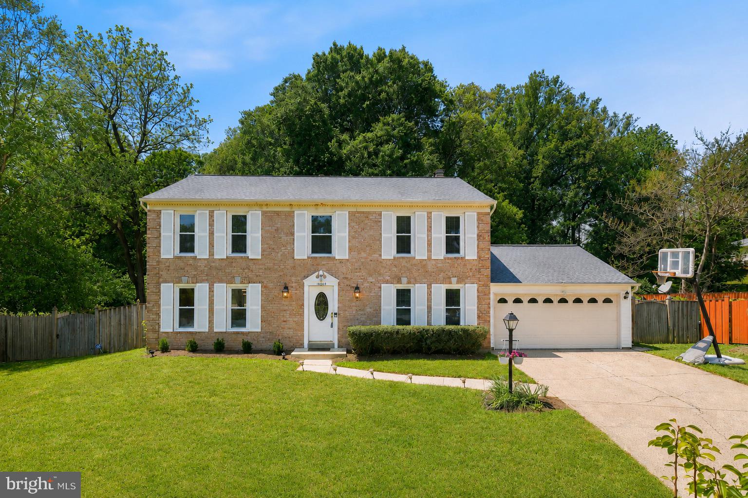 Nestled in the sought-after Bedfordshire community on a quiet cul-de-sac, 10240 Colebrook Avenue presents a thoughtfully expanded and renovated brick-front Colonial with nearly 5,000 total square feet across three finished levels. With four bedrooms, three full bathrooms, and a powder room, the home blends timeless architecture with updated interiors designed for everyday living and entertaining. Inside, light-filled rooms are complemented by hardwood floors throughout the main and upper levels, recessed lighting, crown molding, skylights, and contemporary high-end finishes and hardware. Additional highlights include a new roof in 2016, fresh paint in 2026, kitchen and bathroom updates (2023–2026), a whole-house gas generator, a radon remediation system, a cedar closet, and a significant great room addition that enhances both the scale and functionality of the home. The remodeled gourmet kitchen, updated in 2023, serves as the centerpiece of the main level and includes quartz countertops, a peninsula with breakfast bar, modern white cabinetry, high-end stainless steel appliances, a gas range with hood, marble backsplash, a built-in workstation, and a breakfast area. The kitchen opens directly to the great room addition, one of the home’s defining spaces, featuring cathedral ceilings, skylights, room for a full dining table, and two walls of sliding glass doors that create a seamless connection to the backyard patio and pool area. It is served by an independent HVAC system for four-season enjoyment. The main level also includes a formal living room, a private office with a cozy wood-burning fireplace, a full bathroom, a powder room, and a mudroom/laundry room with access to the refinished garage. Upstairs, hardwood flooring continues throughout for a cohesive look. The generous primary suite includes a spacious walk-in closet with a built-in organization system and natural light, plus a second auxiliary closet. The recently remodeled en-suite bathroom boasts a marble-tiled, glass-enclosed shower and dual vanities with quartz countertops. Three additional bedrooms and an updated hall bathroom complete the upper level. The lower level provides flexible living space with durable LVP flooring, recessed lighting, a large recreation room, and two bonus rooms ideal for hobbies, exercise, or guest overflow, along with utility and storage areas. Outside, the fully fenced backyard is designed for relaxation and entertaining. The property includes an in-ground Anderson pool, currently not in operation, offering future potential for renovation, redesign, or alternative outdoor use of the space. Pool conveys as-is. Ideally located near dining, shopping, entertainment, recreation facilities, walking trails, neighborhood parks, and two private swim clubs, the property also enjoys close proximity to several top-rated golf courses and major commuter routes. Don’t miss this opportunity to own in one of the Washington, D.C. area’s most established and desirable neighborhoods.