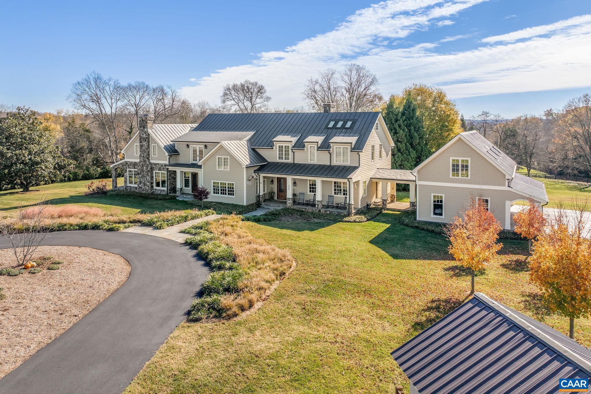 Just 10 minutes from Charlottesville, Milton Farm spans 54 acres of rolling countryside with a well-designed estate and exceptional amenities. The nearly 8,000 sq. ft. main residence includes five bedrooms, six baths, and generous indoor and outdoor living spaces. The pool, hot tub, and pool house offer a perfect space for entertaining, complemented by expansive patios and landscaped grounds.  Three cottages provide ample guest accommodations or rental opportunities. A detached three-car garage includes an upper-level suite, perfect for an office, gym, or private guest retreat.  Equestrian facilities include a three-stall barn, a run-in shed, a large paddock, and an outdoor riding ring. An equipment and tractor shed offers convenient storage. The property has two ponds?one located in the paddock and the other stocked, featuring a dock and bubbler for private use.  Recreational amenities feature a lighted sport court for pickleball and basketball, a sunken firepit, and wooded trails for walking, running, or riding. Open fields and wooded areas create a balance of usable land and natural beauty.  Milton Farm offers a rare mix of comfort, space, and prime location?with easy access to UVA, Downtown, I64 & Keswick Hall.