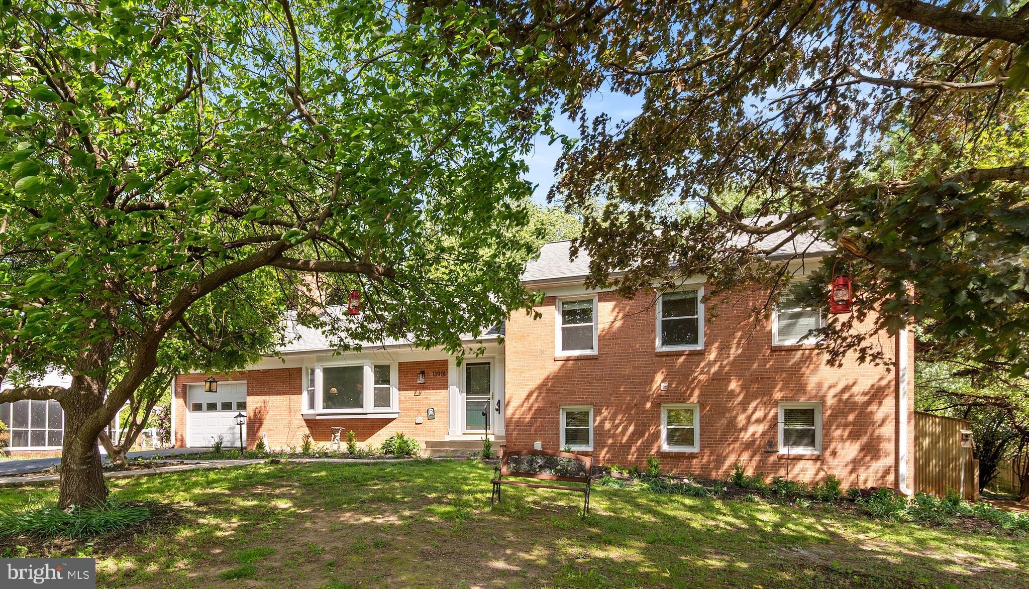 A beautifully updated large home on the end of the street with a large flat backyard and so much privacy—nearly half an acre! This lovingly maintained residence showcases a chef's kitchen with an island, granite counters, stainless steel appliances and more cabinetry and storage than a small restaurant. The wonderful morning room addition has abundant natural light and is a great place to enjoy your morning coffee while looking out into the nature of your expansive private backyard. Hardwood floors run throughout the main level in your large separate dining and living areas, both featuring great windows to the outdoors. The upper level offers three spacious bedrooms and two full baths. The lower above ground level includes a large bedroom, a family room, a full bath with an oversized walk-in shower, and a bright laundry room. There is even another lower level with more rooms!   .. Enjoy outdoor living with a deck, patio, fish pond, shed, and more—perfect for relaxing or entertaining. This home offers both comfort and quality craftsmanship just a couple of minutes from Route 200, New Hampshire Avenue, parks, shopping, and major commuter routes.