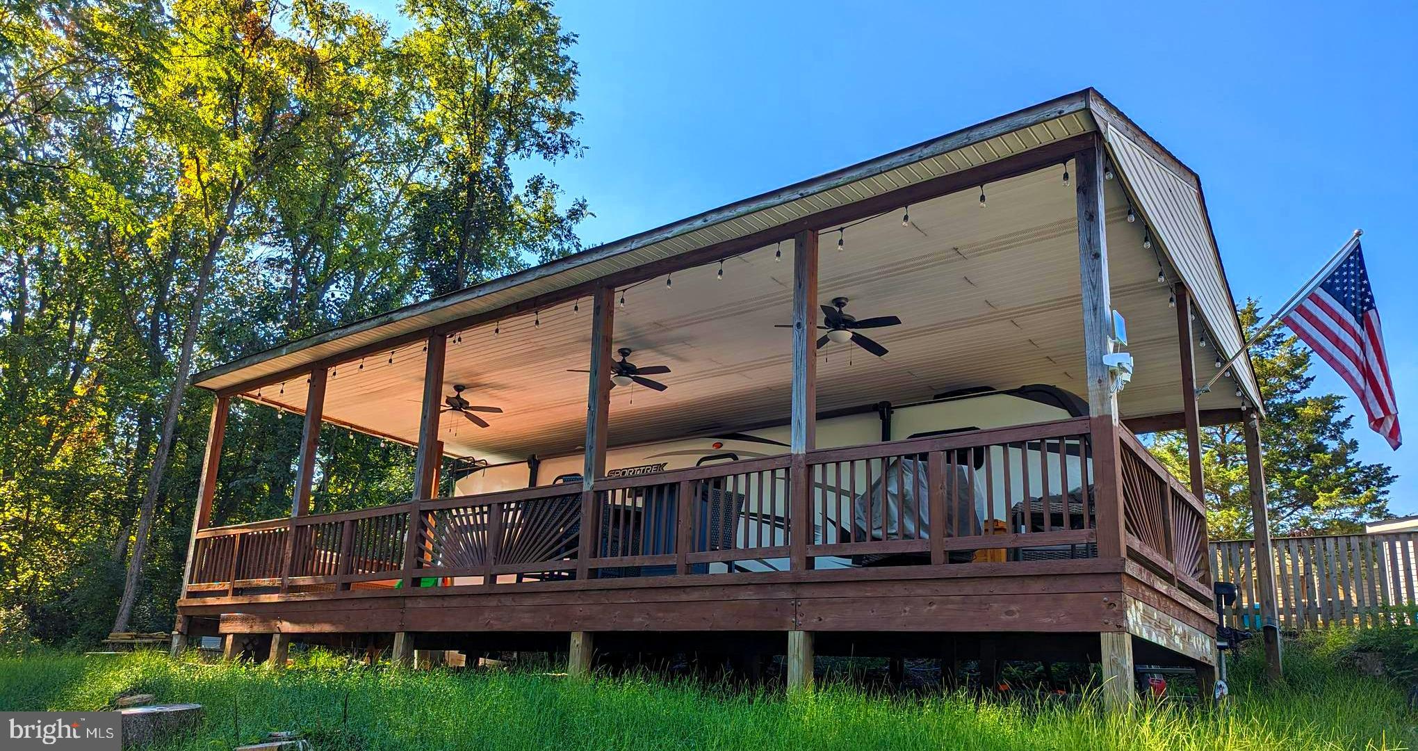 This is a gated community so you need to enter at the guard shack. Entry is not permitted without ID per the office rules. Bring ID's to the office or guard shack for visitor pass. THIS IS A SEASONAL CAMPGROUND! OPEN FROM APRIL 1 TO NOVEMBER 1.
** WELCOME TO RIVER BEND/SEASONAL LOT AVAILABLE TURN KEY** River Bend is a privately owned 400 acre recreational- vehicle camp resort with seasonal activities for members, families and guests. This great RV park is tucked away on the Upper Potomac River of West Virginia, River Bend is one of West Virginia's most popular family seasonal destinations. . Just a short drive from the Washington and Baltimore metro area. Open with utilities from April 1 to November 1. Lot owners have access to their property the entire year. *** Members Enjoy *** * Amazing views and wildlife, Potomac River access, Trails, Swimming pools, Mini-Golf, Youth center, Tennis and basketball courts, laundry facilities, convenience store, deli and lounge. *Bath houses through out the park, boat ramp, bar and grill and even a church located on the grounds. River Bend also hosts numerous activities such as 4th of July fire works, small carnival, bonfires, poker runs, horse shoe tournaments, car show, Halloween Trick or Treat and so much more. 
***Property Details ***  Great Lot that backs to trees with no one behind you.  Pavilion with deck, sewer.
Come and check out this amazing lot  **** Lets bring an offer to to table! ***BRING YOUR BEST OFFER*** YOU WON'T WANT TO MISS THIS ONE.***