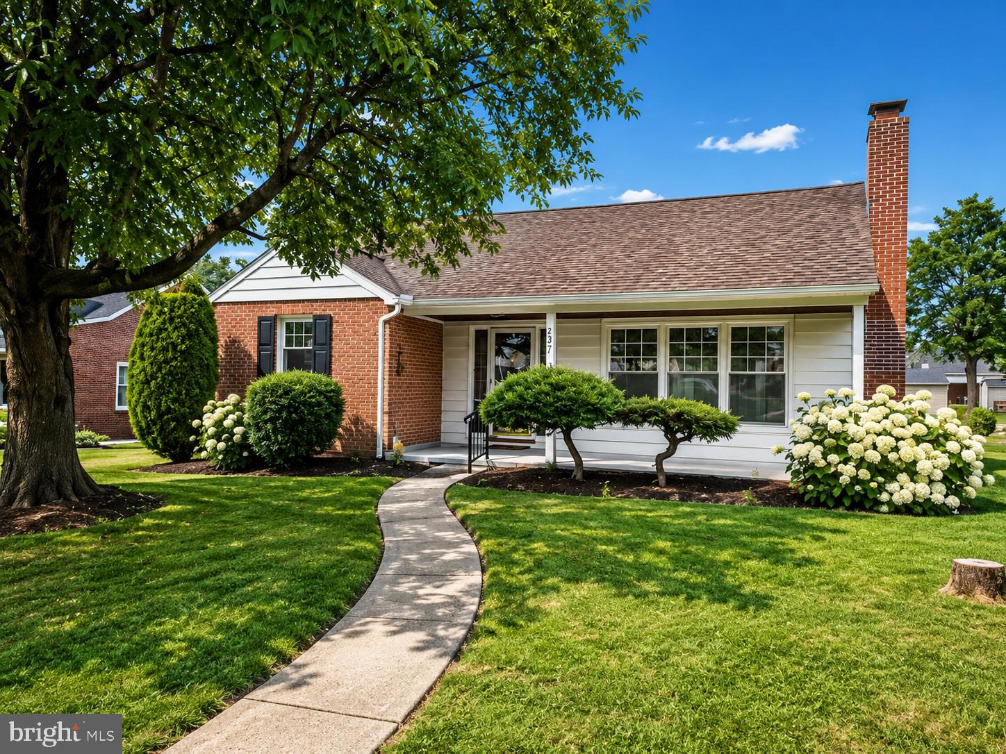 Move right into this beautifully renovated brick Cape Cod in the heart of Birdsboro, just a few blocks from Daniel Boone High School! This charming home has been thoughtfully updated from top to bottom and offers the perfect blend of classic character and modern amenities.

Step inside to discover gorgeous hardwood floors throughout the main level, a bright and inviting living room featuring a cozy fireplace, and a beautifully remodeled full bath. The stunning new kitchen boasts white cabinetry, granite countertops, new appliances, updated flooring, and is ready for everyday living or entertaining.

The home offers two spacious bedrooms on the main level and a newly finished third bedroom on the second floor complete with its own energy-efficient mini-split system for personalized heating and cooling.

Additional improvements include a newer gas heating system, central air conditioning, energy-efficient replacement windows, and a roof that is approximately four years old, providing added peace of mind for years to come.

Outside, the backyard, complete with a storage shed and convenient walkway leading to the newly added off-street parking pad accessible from the rear alley.

This home is truly move-in ready and offers the perfect opportunity to enjoy economical homeownership for many years to come.  Don't miss your chance to make this exceptional property your new home!