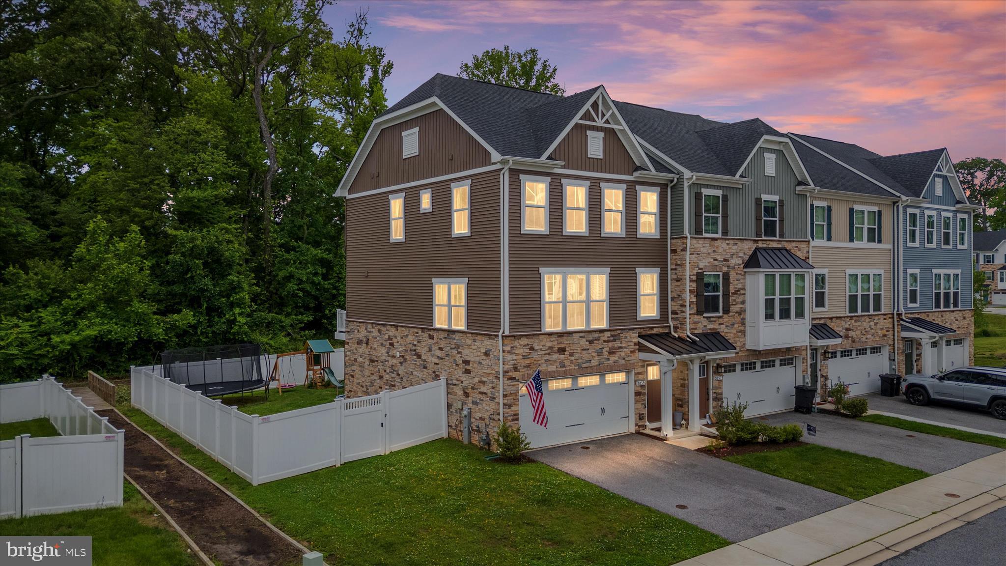 Welcome to this beautifully maintained townhome offering the perfect blend of modern design and comfort in a sought-after water privileged community. Featuring an open-concept layout filled with natural light, this spacious home showcases luxury vinyl plank flooring, recessed lighting, and thoughtfully designed living spaces throughout. The gourmet kitchen is the heart of the home, complete with a large center island with seating, quartz countertops, stainless steel appliances, abundant cabinetry, and seamless flow into the dining and living areas. Step outside to the private rear trex deck overlooking your fully fenced backyard, situated on one of the largest lots you’ll find for a townhome and nestled on a premium homesite backing to the woods. Upstairs, the spacious primary suite offers a tray ceiling, oversized walk-in closet, and a beautifully appointed en-suite bath with dual vanities and a glass-enclosed shower boasting dual shower heads. Both additional bedrooms feature scenic water views, providing a peaceful backdrop and flexibility for guests, home office space, or growing households. The finished lower level provides versatile additional living space with access to the backyard as well as the attached garage. Located in a water privileged community, residents enjoy access to scenic nature trails, a private fishing pier, picnic areas, and are located just minutes from a public boat launch ramp, perfect for embracing the waterfront lifestyle and connecting with nature.  Schedule your showing today!