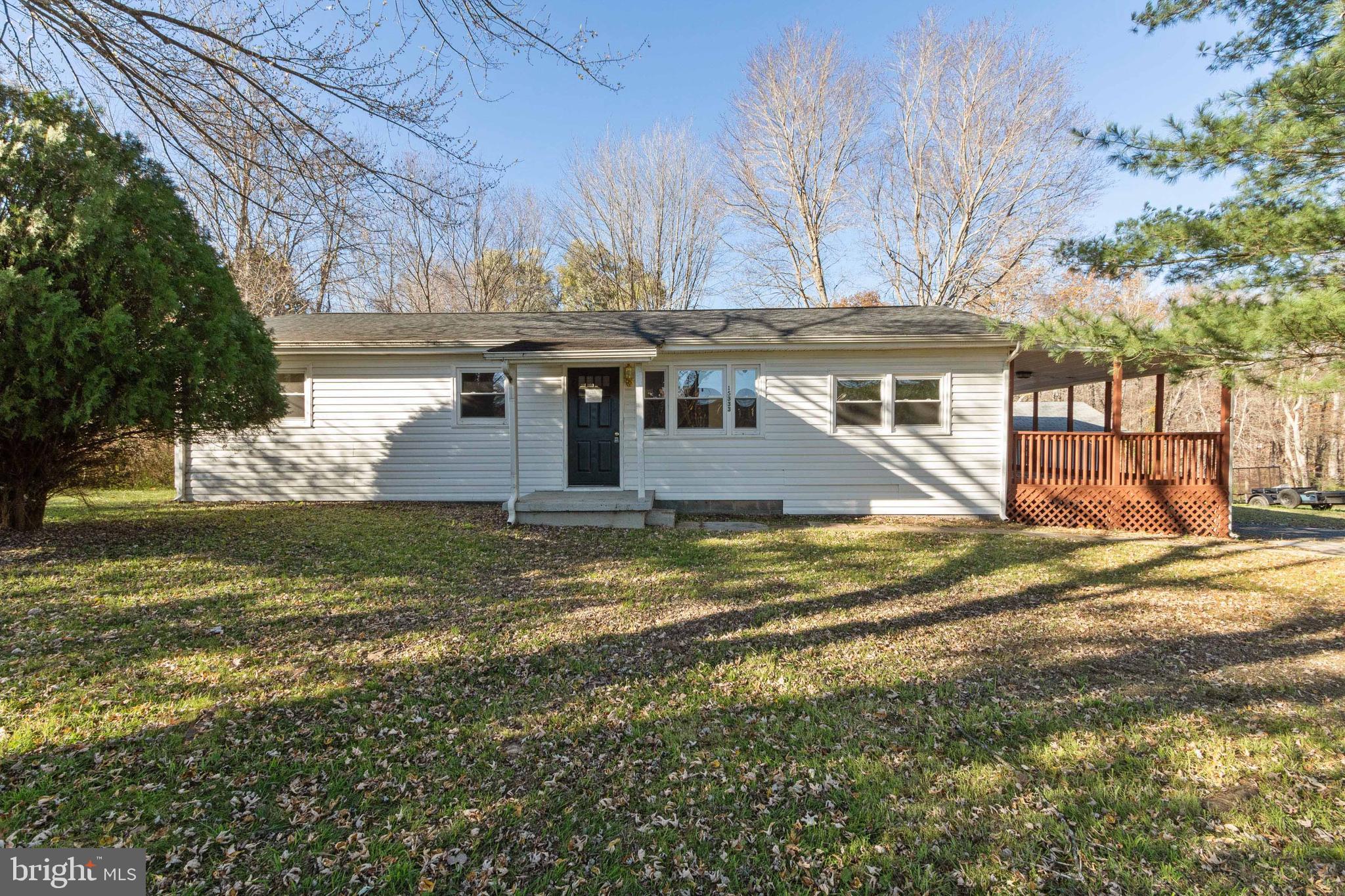 Back on the market with a New Improved Price, don't pass up this opportunity to purchase this gem. New Improved Price, don't miss out on this diamond in the rough. Peaceful, private rambler featuring 3-bedrooms and 2-full bathrooms, a full kitchen with updated flooring, a spacious living room with gleaming hardwood flooring and custom paint throughout. The large primary bedroom ensuite with updated flooring looks out onto the side deck. There are two additional bedrooms that have custom-painted walls as well as hardwood flooring. All the windows and both bathrooms in the house have been updated within the past few years. Your new home is located on a one-acre lot and has a wrap-around deck for outdoor entertaining. Close to shopping, restaurants, theaters, commuter parking lots and I-95! This property may qualify for Seller Financing (Vendee). * Property was built prior to 1978 and lead-based paint may potentially exist.*