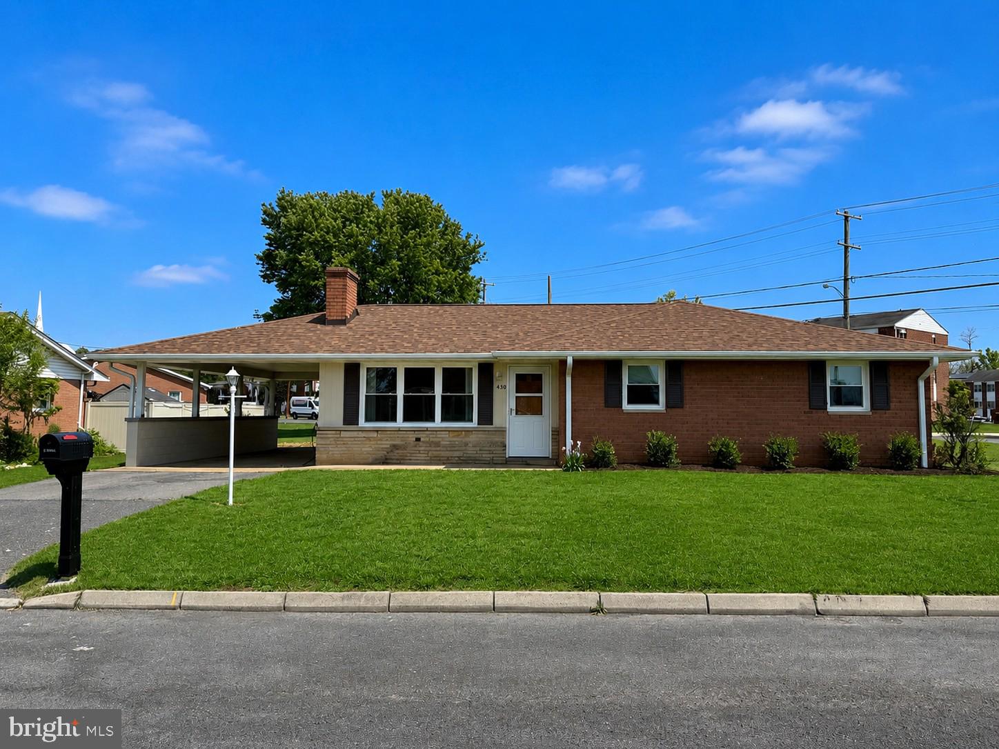 Beautifully updated and impeccably maintained, this all-brick 4-bedroom, 2.5-bath rancher is the definition of move-in ready! Situated on a desirable corner lot, this home showcases quality updates and pride of ownership throughout. Step inside to discover freshly refinished hardwood floors, fresh paint, and tasteful updates that create a warm, inviting feel from the moment you enter. Gather around the cozy fireplace in the spacious living room, creating the perfect setting for relaxing evenings at home. The impressive list of recent improvements includes a new roof, new windows, new furnace, new central AC, new soffit, fascia and gutters, two beautifully renovated bathrooms, and brand-new appliances—offering peace of mind and worry-free living for years to come. The spacious basement recreation room provides incredible flexibility with room for entertaining, hobbies, a game room, or additional living space. Outside, enjoy the convenience of a carport and unwind beneath the rear covered patio. Homes in this condition are hard to find—updated, spacious, and ready for you to simply unpack and enjoy!