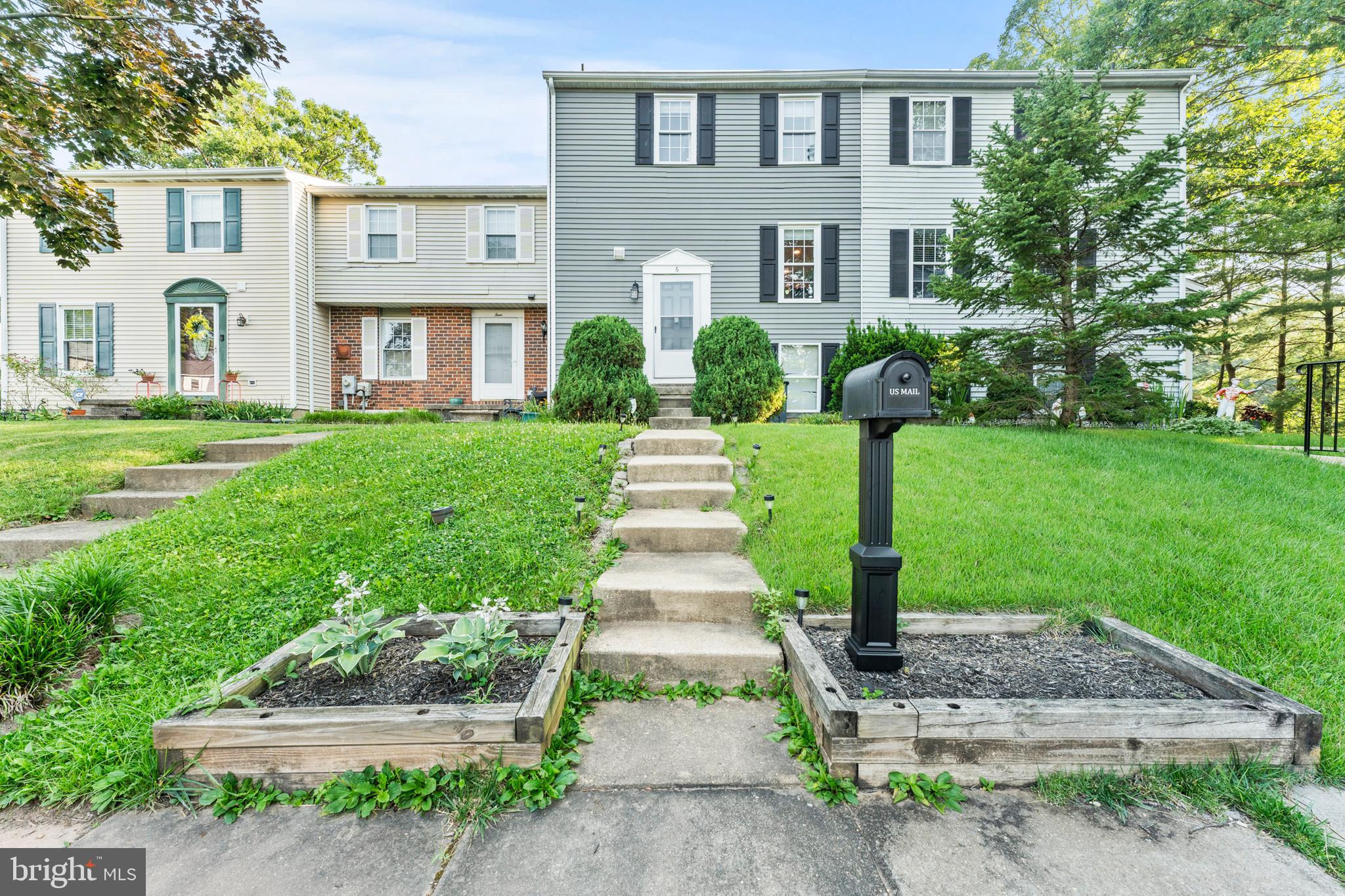 Welcome Home to 6 Crosswall Ct!
The main level offers everyday convenience with a powder room, coat closet, and laundry area just inside the entrance. The sun-filled dining room is bathed in natural light, while the kitchen features abundant floor-to-ceiling cabinetry and a spacious pantry, providing exceptional storage. The generously sized living room opens to a private deck overlooking the backyard—perfect for relaxing or entertaining.

Upstairs, you'll find three bedrooms, including a primary suite complete with its own private en-suite bath. The partially finished lower level offers flexible space for recreation, entertaining, or additional storage. Don't miss the opportunity to make this home yours—schedule your private tour today!