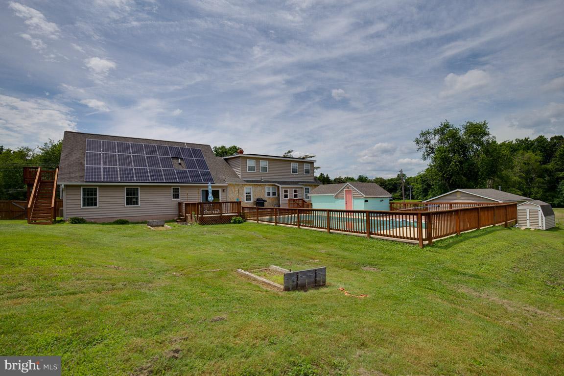 WHY WAIT FOR NEW..THIS AMAZING UPDATED CAPE COD WITH 1 ACRE OF FLAT LAND, FRONT PORCH,IN GROUND POOL & SUNDECK, EXTRA PARKING, &FENCED YARD. 1ST FLOOR MASTERBEDRM,SEPERATE FAMILYRM,LIVINGRM W/PELLET STOVE, KITCHEN AND DININGRM, & PLAYRM/DEN. UPSTAIRS YOU HAVE 2 MORE BEDROOMS AND A HUGE POOLRM/GREATROOM. UPDATED BATHS AND KITCHEN, BASEMENT HAS PLENTY OF STORAGE SPACE. LESS THAN 10 MILES FR LAPLATA.