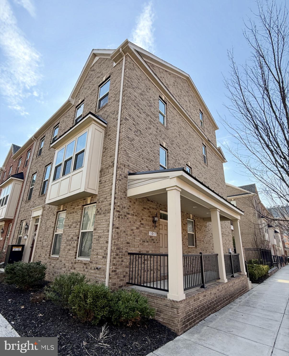 $20K Price Drop!!!  Welcome to 1017 McDonogh Street, located in the sought-after Townes at Eager Park community in Baltimore. Just north of Johns Hopkins Hospital and located in the $17,000 JH Live Near Your Work Grant area, this well-maintained end-unit home, built just 10 years ago, offers over 2,000 square feet of thoughtfully designed living space across four finished levels. Featuring 3 bedrooms, 3 full bathrooms, a one-car garage, and an additional parking pad, this home combines modern convenience with comfortable city living. Abundant windows throughout flood the home with natural light, creating a bright and inviting atmosphere.

The second level boasts a spacious living room ideal for entertaining, while the kitchen offers ample cabinet space, a center island, and stainless steel appliances, dining area with direct access to a rear deck perfect for enjoying your morning coffee. The third level includes two bedrooms, one with an en-suite bath, plus an additional full hallway bathroom. The top level features a private third bedroom with its own full bath, providing a perfect guest suite or primary retreat. Conveniently located laundry sits just at the top of the stairs for easy access.  Enjoy Baltimore City living with a modern touch.