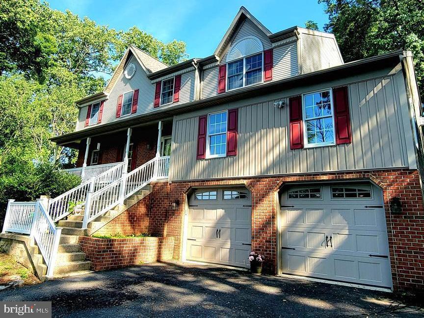 Situated on 1.17 acres in Wilson School District, this custom-built home offers over 5,100 square feet of finished living space and a unique combination of privacy, convenience, and room to grow. Tucked back from neighboring properties yet just minutes from shopping, dining, schools, parks, and major commuter routes, this property provides the space today's buyers are searching for. The expansive floor plan features (4) four spacious bedrooms, 3.5 baths, an updated kitchen, and multiple living and entertaining areas designed to accommodate gatherings of any size. The upper level includes four generously sized bedrooms, including a primary suite with an updated bath and large walk-in shower. The finished lower level adds substantial additional living space and offers endless possibilities for a family room, recreation area, home office, fitness space, or multi-generational living. One of the home's standout features is the impressive covered paver patio overlooking the rear yard, creating an ideal setting for outdoor entertaining and everyday enjoyment. Additional features include natural gas heat, central air, an oversized two-car garage, abundant storage, and a newer water softener system. Rarely does a Wilson School District property offer this much finished square footage, outdoor living space, and convenient location all in one package.