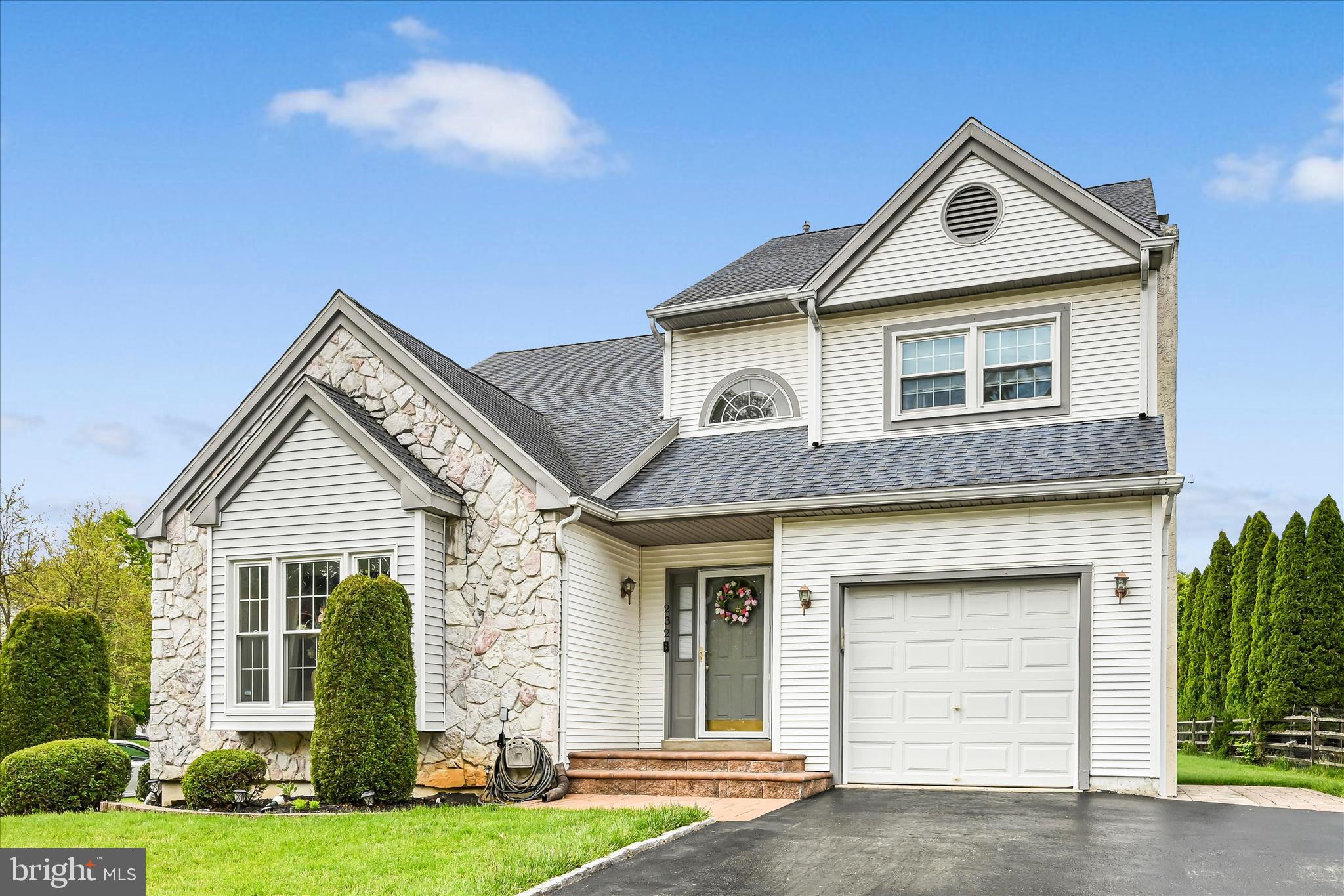 Rare opportunity to own a beautifully maintained 4-bedroom, 2.5-bath home in the highly desirable Bridgewater Development! A dramatic two-story foyer welcomes you into the stunning sunken living room featuring soaring cathedral ceilings. Flow seamlessly into the inviting dining room and updated eat-in kitchen, complete with abundant cabinetry, generous storage, and an oversized refrigerator.
The sunken family room offers a cozy gas fireplace and large window overlooking the backyard, creating the perfect gathering space. The first floor also features a convenient powder room, laundry area with oversized pantry storage room, and attached one-car garage.
Upstairs, the spacious primary suite includes a renovated bathroom and walk-in closet. Three additional bedrooms and an updated hall bath complete the second floor.
The fully finished basement provides exceptional additional living space, including a large storage/pantry area, office/movie room, sitting area, weight room/gym, and even more storage options.
Additional highlights include new staircase carpeting, paver entry, neutral decor, crown molding, hardwood flooring throughout the first and second floors, replacement windows, a new dishwasher, new laundry tub and a private tree-lined backyard with an expanded concrete patio perfect for outdoor entertaining and irrigation system.
Don’t miss your chance to make this exceptional property your new home!