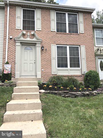 Updated 2 bedroom, 2.5 bath brick front townhouse for rent in Laurel Woods. Freshly painted, updated hvac, primary bedroom with walkin closet, finished basement, large deck in rear that backs to woods. This home is move in ready and close to shopping, schools, and parks. AVAILABLE NOW! Must use Long and Foster Rental application.