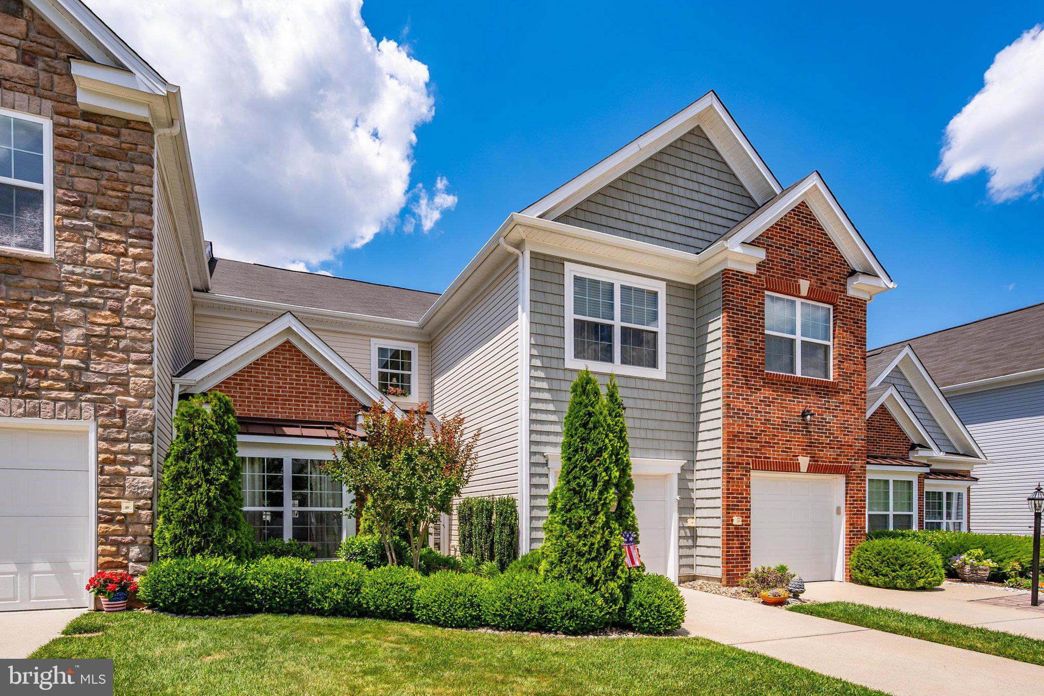 Welcome to the award-winning community of Plantation Lakes Golf & Country Club, where resort-style living meets everyday comfort. This highly sought-after Jefferson Model townhome is ideally situated just a short walk from the community's premier amenities and is loaded with upgrades throughout.

Offering 3 bedrooms, 2.5 bathrooms, and a versatile bonus room that can easily serve as a 4th bedroom, home office, or recreation space, this beautifully landscaped and well maintained home features an open-concept floor plan designed for both entertaining and comfortable living.

The main level showcases hand-scraped engineered hardwood flooring and a spacious chef's kitchen complete with stainless steel appliances, a gas cooktop, 42" glazed cabinetry, corner pantry, and an oversized breakfast bar with seating for six. The adjoining dining and living areas create the perfect gathering space for family and friends.

Step outside onto patio, ideal for grilling and outdoor dining, overlooking a beautifully landscaped privately fenced backyard.

Upstairs, you'll find a generous loft-style sitting area, two guest bedrooms that share a full bath, and a finished bonus room offering exceptional flexibility. The spacious primary suite is conveniently located near the laundry area and features a comfortable sitting area, walk-in closets, double vanity, walk-in shower, and linen closet.

Residents of Plantation Lakes enjoy access to an impressive array of resort-style amenities, including the Arthur Hills Championship Golf Course, recipient of Golfweek's 2025 Best in State Award. Select memberships include unlimited golf. Additional amenities include a luxurious clubhouse, the award-winning Landing Bar & Grille, multiple swimming pools, fitness centers, tennis courts, walking trails, community centers, and more.

Experience the lifestyle you've been dreaming of in one of Sussex County's most desirable communities. Schedule your private showing today—this exceptional home won't last long!
