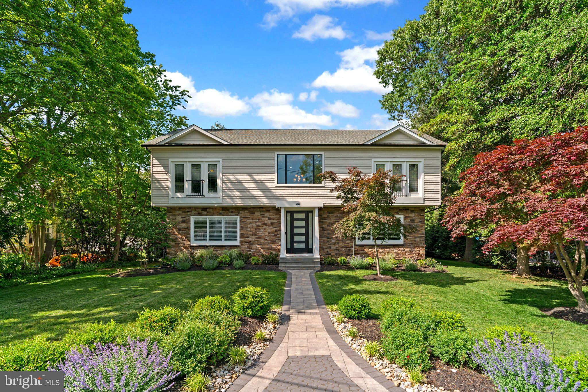 Nestled in Severna Park's highly desirable water privileged community of Linstead on the Severn, this exquisitely renovated home offers sophisticated living with year round views of the Severn River. Situated on a generous, flat 1/3+ acre lot, the property boasts a beautiful in-ground swimming pool and a fabulous outdoor entertaining space perfect for enjoying the summer months. Renovated from top to bottom in 2021, this impressive residence features over 5,000 finished square feet, including five bedrooms, four full and two half bathrooms, and a convenient rear-entry two-car garage. The stunning open-concept main level is highlighted by a striking dual-sided fireplace and flows seamlessly into the chef-inspired gourmet kitchen with a large center island, walk-in pantry, beautiful stainless steel appliances, and ample cabinet and counter space. The spacious great room features high ceilings and an abundance of natural light, while a dedicated main-level home office provides a private workspace. A convenient main level bedroom suite is perfect for guests, in-laws or the aupair. A thoughtfully designed, dreamy mudroom with built-in cabinetry adds practicality and convenience with access to the pool and garage.  Upstairs, a versatile loft area overlooks the grand two-story foyer, and you'll find four private bedroom suites, 2 with en-suite bathrooms plus a beautiful hall bathroom. The grand primary suite offers a spacious bedroom and a spa-like bathroom with a soaking tub and integrated shower. All bedrooms feature spacious closets and a neutral color palette. The finished lower level, with walk-up stairs to the rear yard, includes a home gym, a recreation area with a wet bar, a half bathroom, and ample storage. Residents of Linstead enjoy unparalleled access to a private community beach on the Severn River and a vibrant, active community with events for everyone. Easy commuter access to major routes. Walk to downtown Severna Park and the B&A Trail. Close to restaurants, shopping & entertainment. Schedule your private tour today.