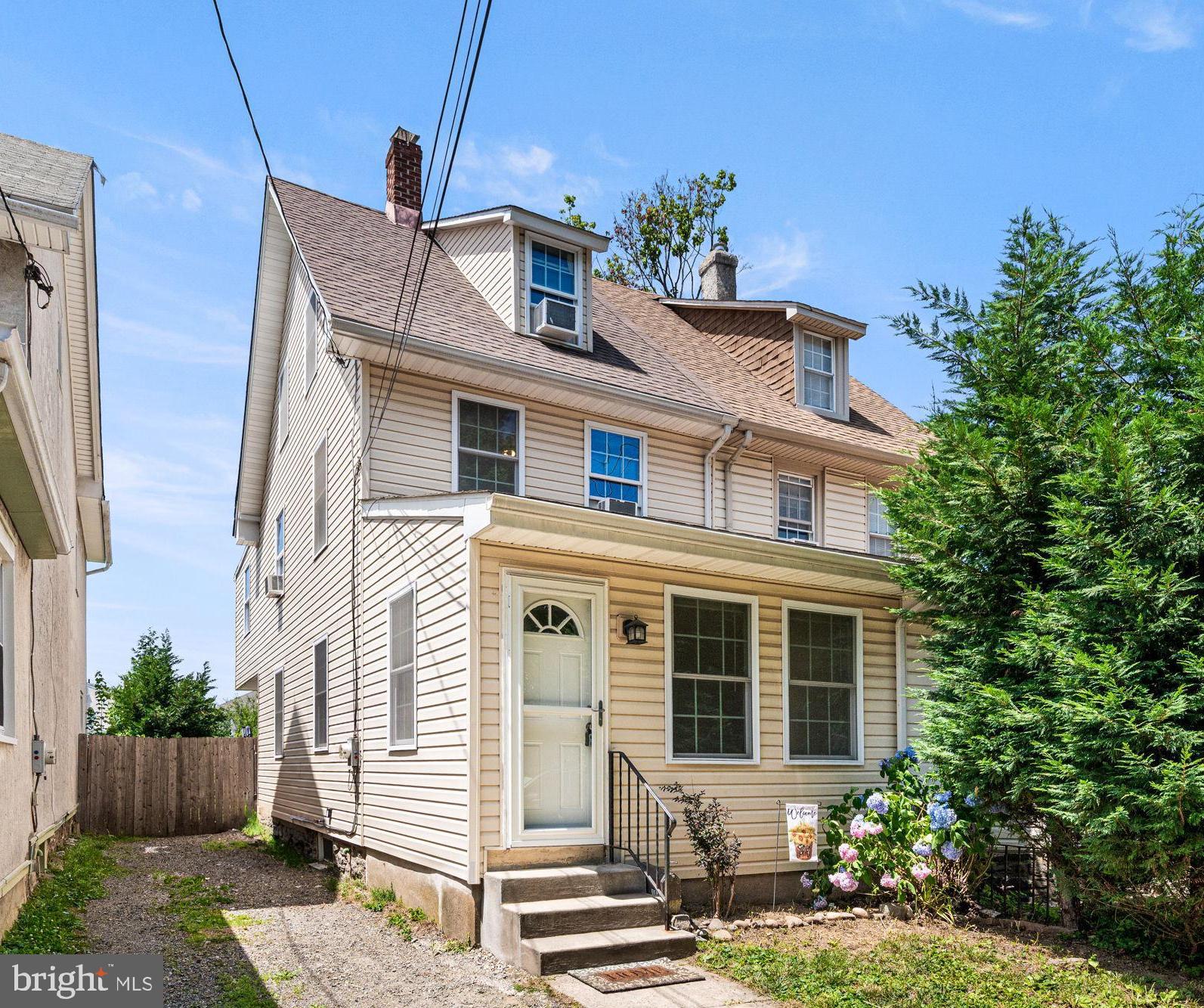 Welcome to 104 Garrett Avenue in the heart of Bryn Mawr. This spacious and sun-filled twin home offers 3 bedrooms with the potential for a fourth, 1.5 baths, off-street parking, and a location that is hard to beat. Freshly painted and full of opportunity, this home offers the chance to make updates and add your own personal touch over time.  Big ticket items that have been completed include Vinyl siding in 2016, new roof in 2016, new boiler in 2019 and  new water heater in 2019. WOW!

The first floor features a bright living room, dining room, kitchen, powder room, and a convenient mudroom with laundry. Upstairs, the second level offers three bedrooms all on one level, along with a newer full tile bath. The third floor provides flexible bonus space with the potential to serve as a fourth bedroom, home office, guest room, or playroom.

Additional highlights include hardwood flooring, off-street parking for two cars, and a large backyard with plenty of room to enjoy. Located in Radnor Township and within the award-winning Radnor School District, this home offers wonderful access to everyday conveniences. Enjoy being very close to Villanova, just steps from the high-speed line, a short walk to the train station or bus stop, and close to nearby parks, shops, restaurants, and all that downtown Bryn Mawr has to offer.