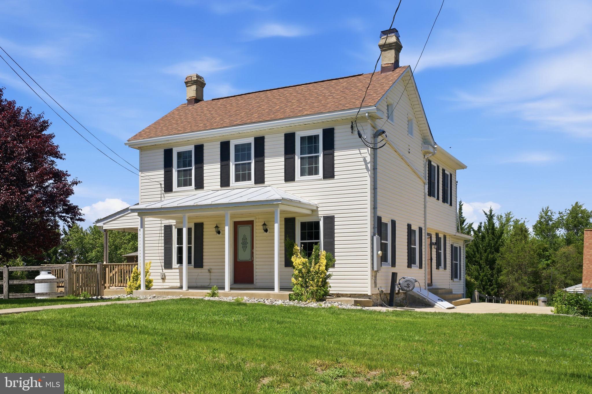 Available July 15th! Welcome to 10420 Daysville Road – A Unique Farmhouse Retreat in Walkersville Nestled on 1.25 acres of picturesque land, this charming farmhouse-style residence offers the perfect blend of historic character and modern upgrades. Set back from the road with tree-lined views and serene privacy, the home is conveniently located just moments from schools, Heritage Farm Park, the Walkersville Library, shopping, and dining. A circular driveway welcomes you with ample parking and beautifully landscaped walkways, leading to a spacious garage with abundant storage. Adjacent to the garage is a fenced-in barn. The main home features hardwood flooring, along with a warm and inviting layout with thoughtful design touches throughout. The sunlit living room showcases wood beams, a stacked stone accent wall, and is generously sized for entertaining or relaxing. The kitchen is a showstopper, complete with white cabinetry, granite countertops, an expansive island, and an oversized farmhouse sink. A mudroom and laundry area lead to the backyard oasis. Upstairs, the owner’s suite features vaulted ceilings and an en-suite bath with a soaking tub and separate shower. Two additional bedrooms and a hall bath complete the upper level. The main level includes room for office/den and full bath—perfect for guests or multigenerational living. Outside is an entertainer’s paradise featuring a partially covered oversized deck, a hardscaped patio with built-in firepit and seating wall, a circular pool, a large grassy yard, a shed, and even a chicken coop. This truly special property is one-of-a-kind—schedule a private tour!
