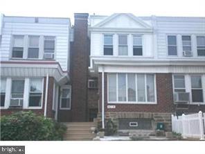 Investor Special - just about "rent ready", needs some minor TLC. 3 bdrm 1 bath straight-thru, row, enclosed front porch, laminated wood floors, ceiling fans, wall air cond, large kitchen, bath w/jacuzzi tub, replacement windows thru out, vinyl siding and 2 steel doors, garage was removed.  Easy to show.