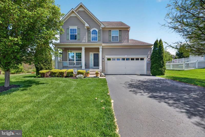 Bright, welcoming and move in ready, this beautifully maintained home in Sterling Glen offers the perfect blend of style and comfort. Step inside and discover an open-concept layout filled with natural light, featuring a spacious living room, dining room, family room, kitchen and breakfast room ideal for both everyday living and entertaining.
Upstairs you will find generously sized bedrooms with plenty of closet space. The finished lower level offers plenty of versatility, complete with an additional bedroom-ideal for guests, or a private home office. This flexible space adds valuable living area and opens up a variety of possibilities to fit your needs. Outside, enjoy a nice evening on the front porch or unwind in the backyard perfect for gardening or gathering.  All this and more situated in a Cul-de-sac that is conveniently located near shopping, dining and commuter routes. This home checks all the boxes-and then some. Schedule your private showing today!
